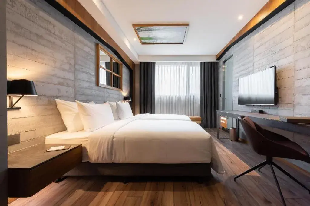 Bed in Brio Hotel