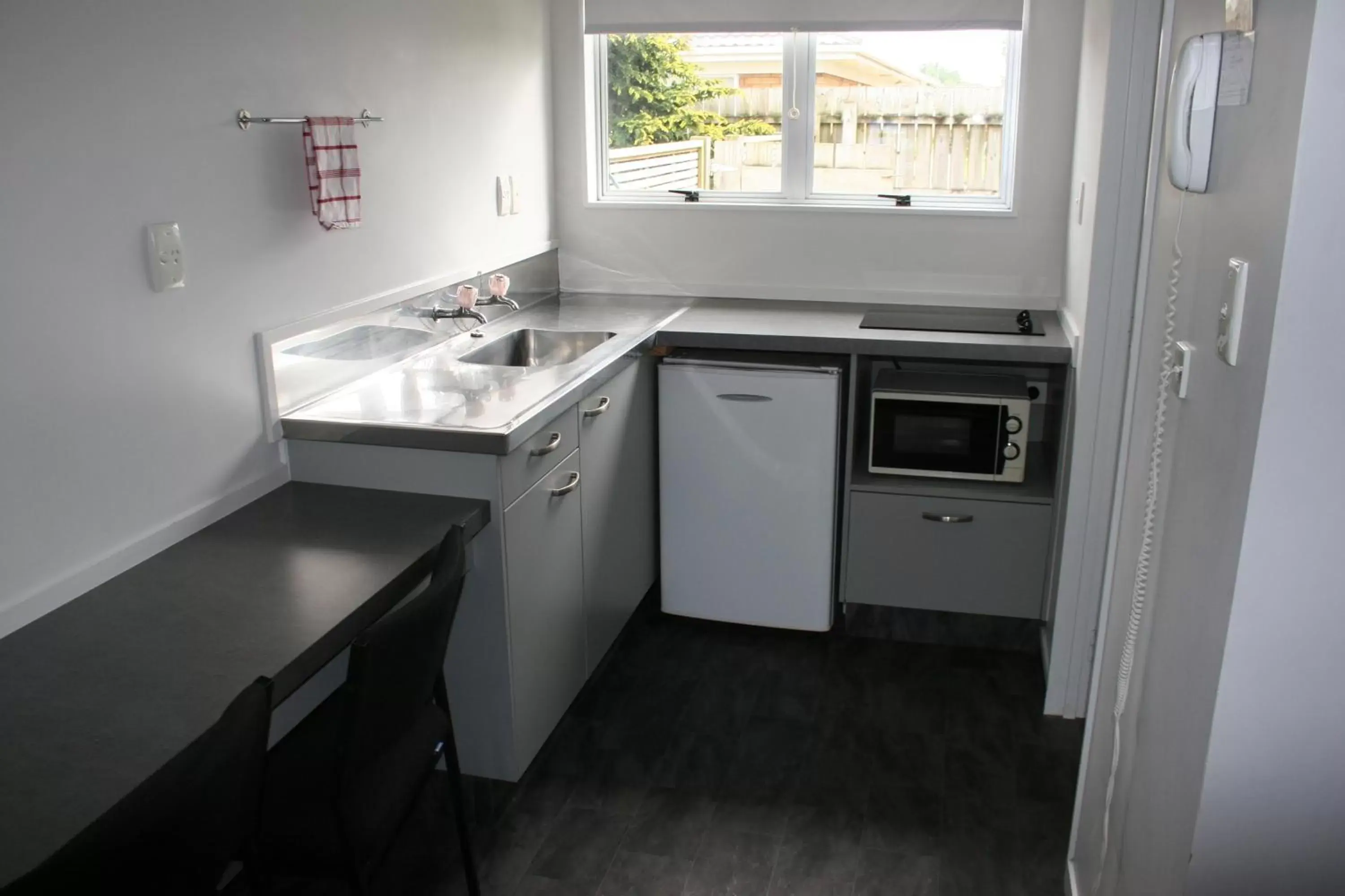 Kitchen or kitchenette, Kitchen/Kitchenette in Burgundy Rose Motel