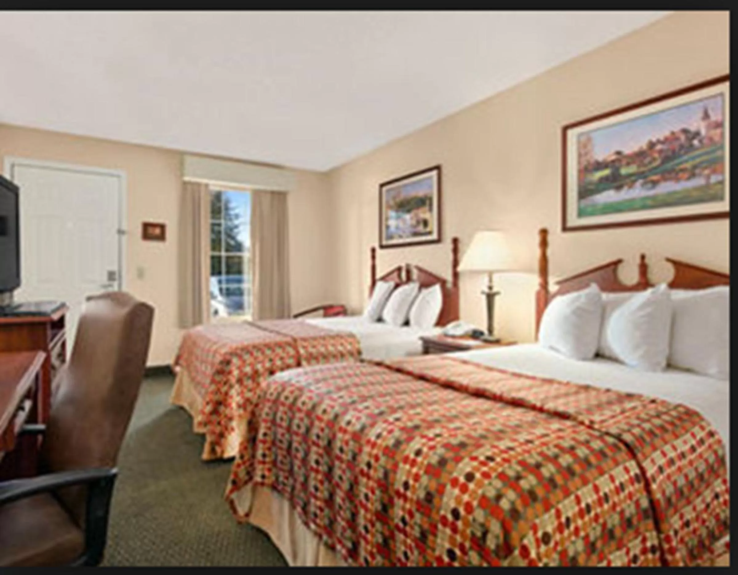 Bed in Baymont by Wyndham Sanford