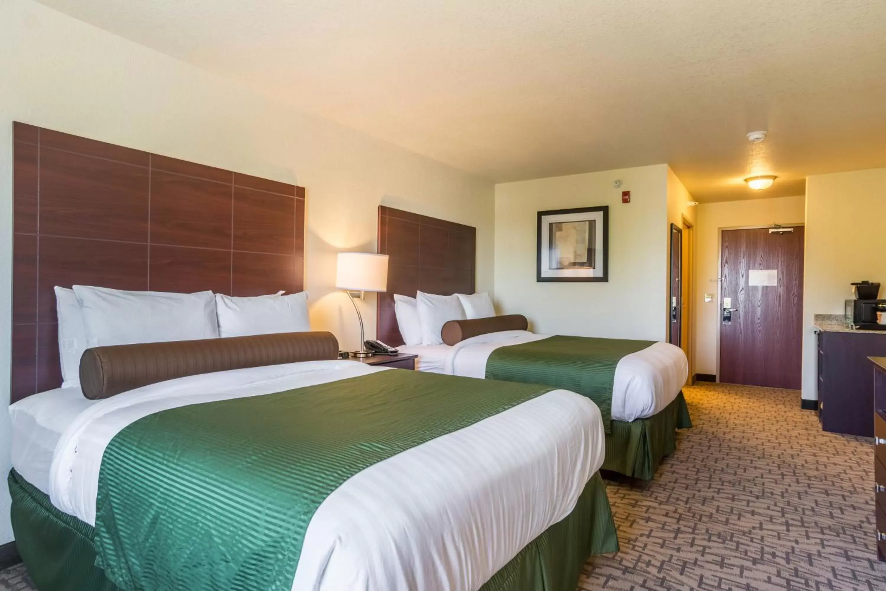 Bed in Cobblestone Inn & Suites - Lakin