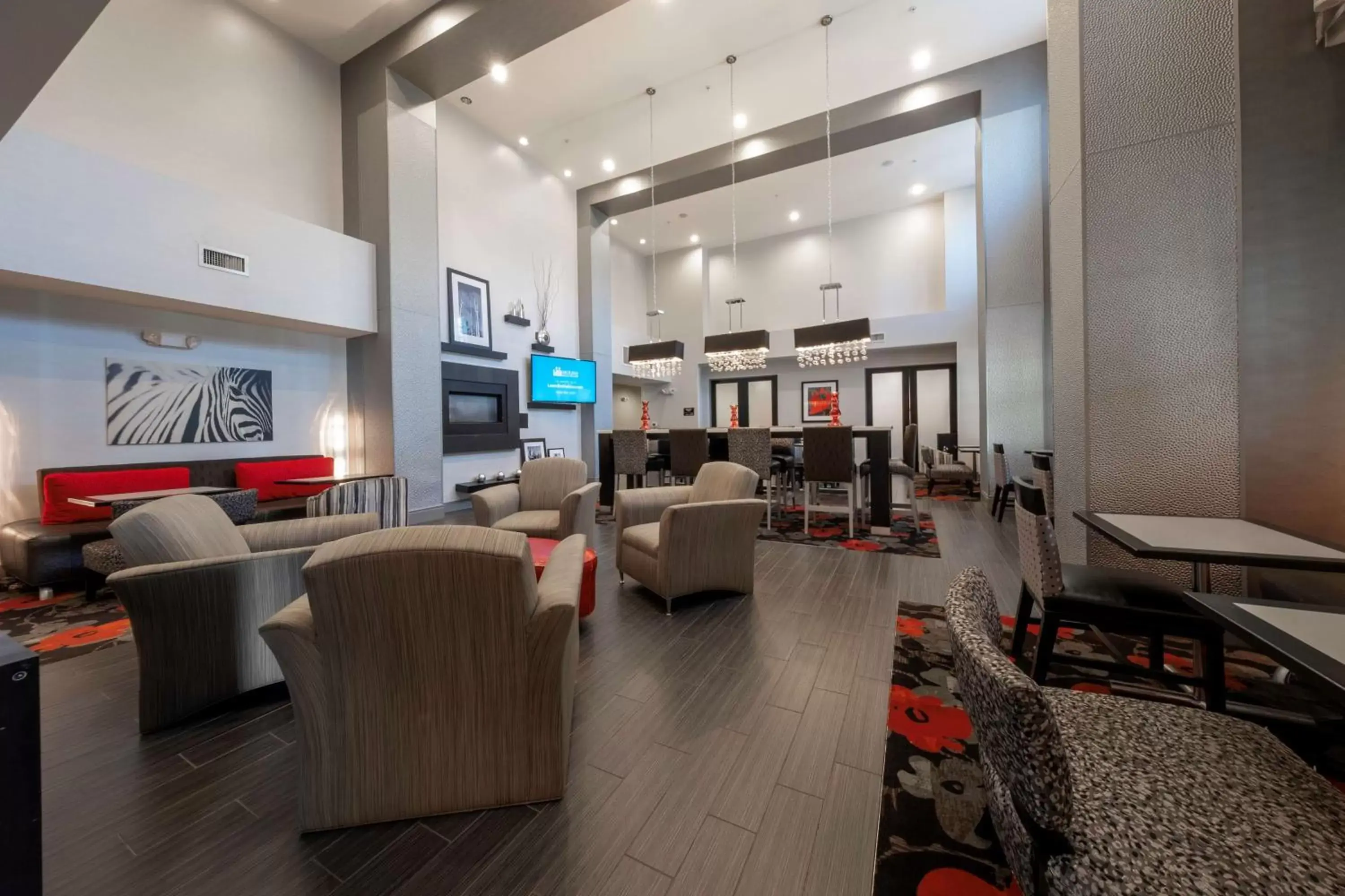 Lobby or reception in Hampton Inn & Suites DuPont Lobby or reception in Hampton Inn & Suites DuPont