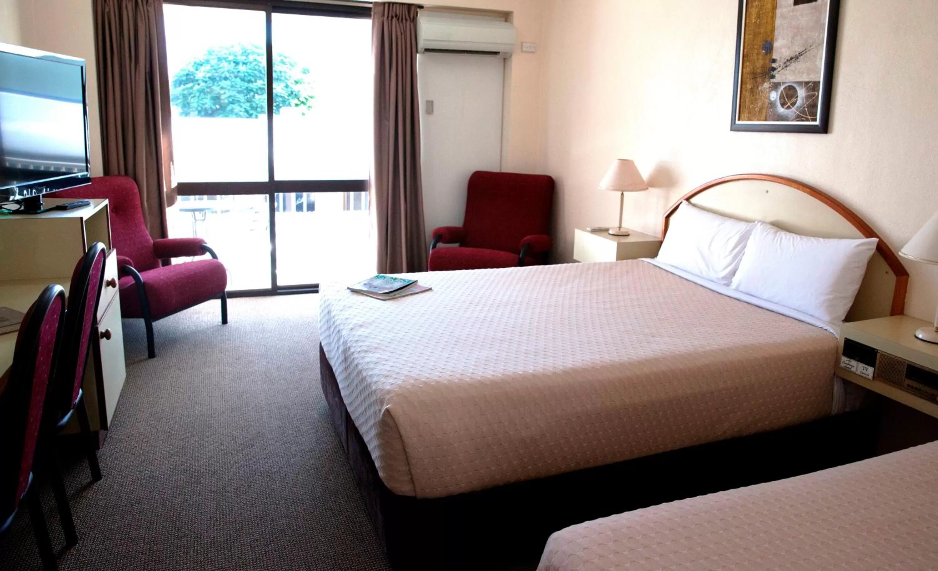 Bed in Longreach Motor Inn