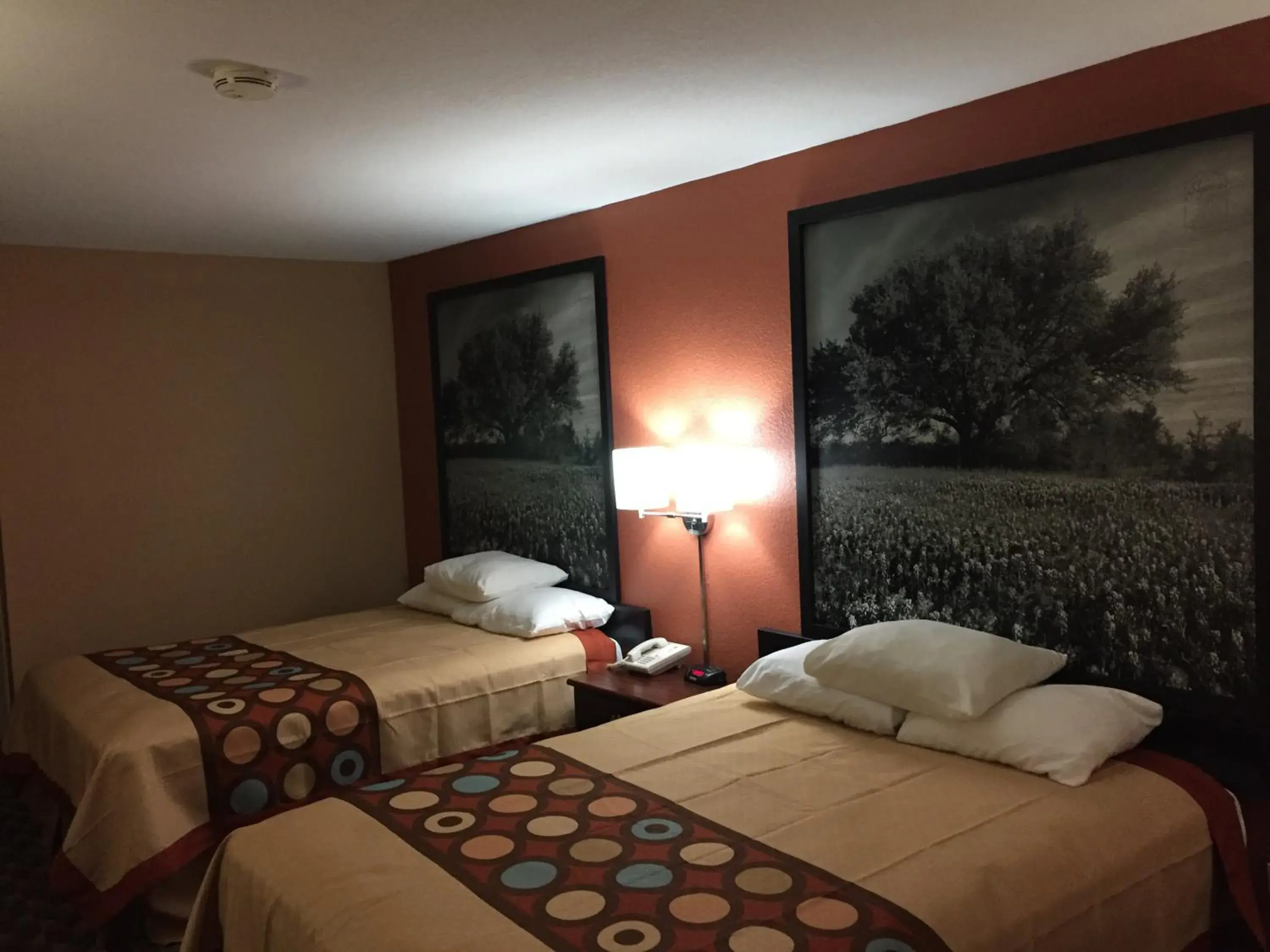 Bed in Super 8 by Wyndham Bastrop TX