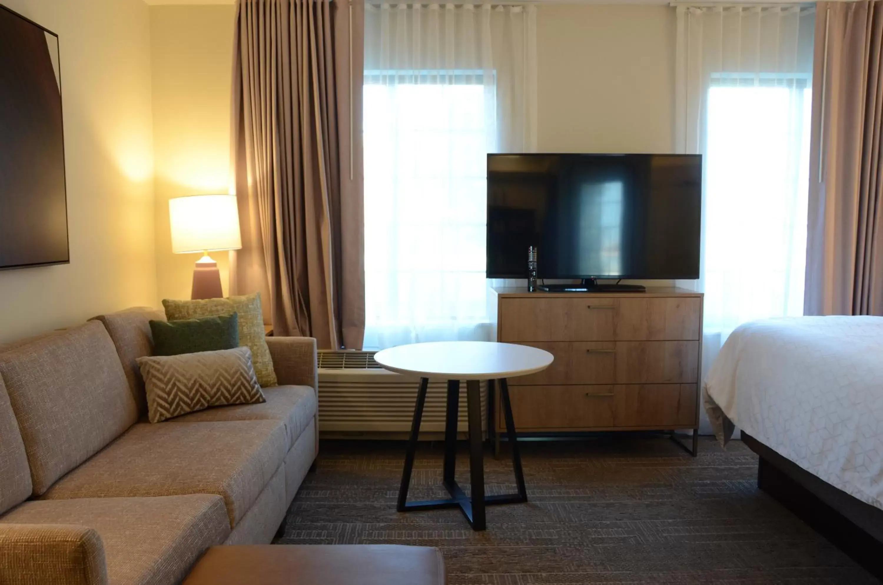 Bedroom, TV/Entertainment Center in Staybridge Suites Nashville SE - Murfreesboro, an IHG Hotel