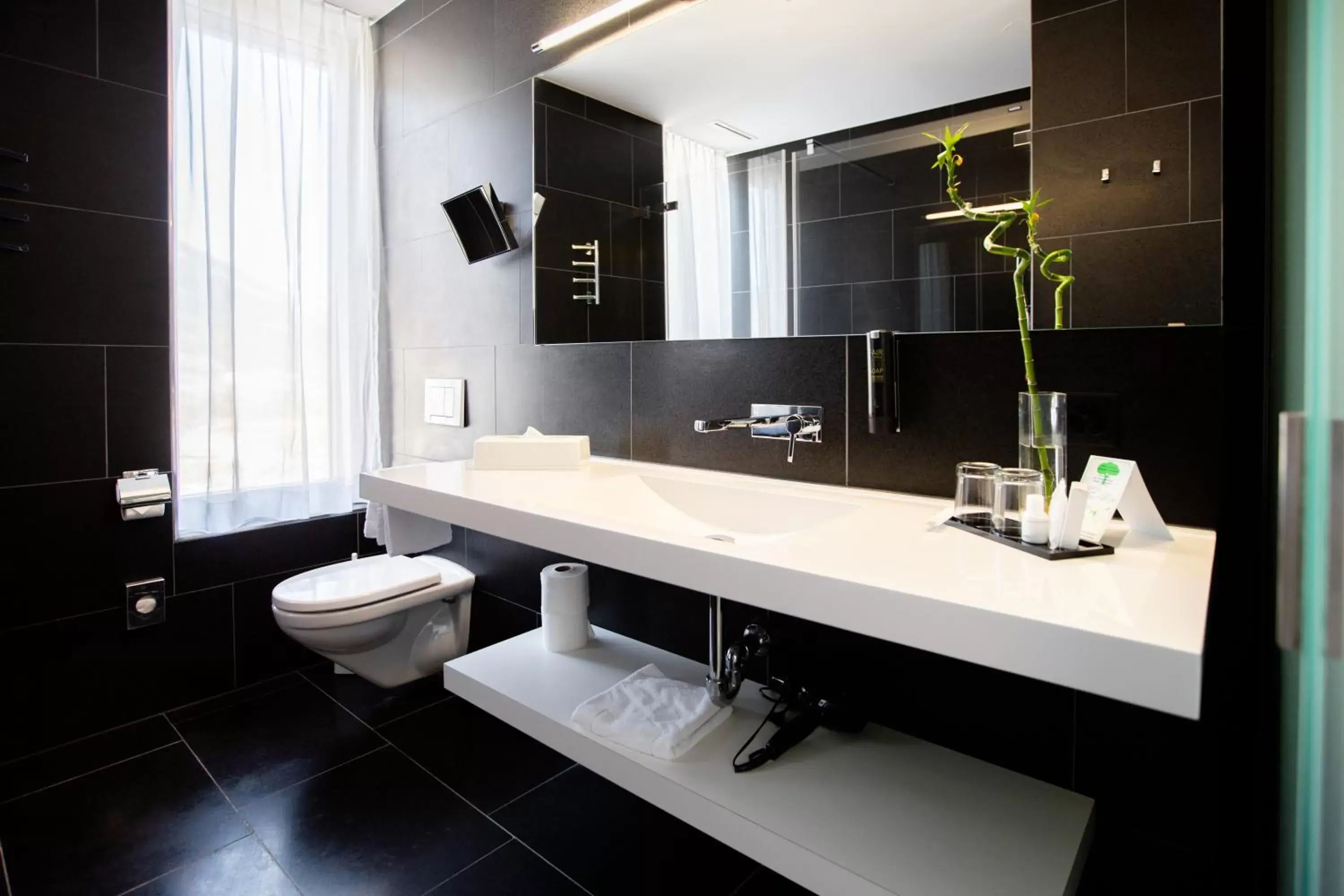 Bathroom in Mercure Chur City West