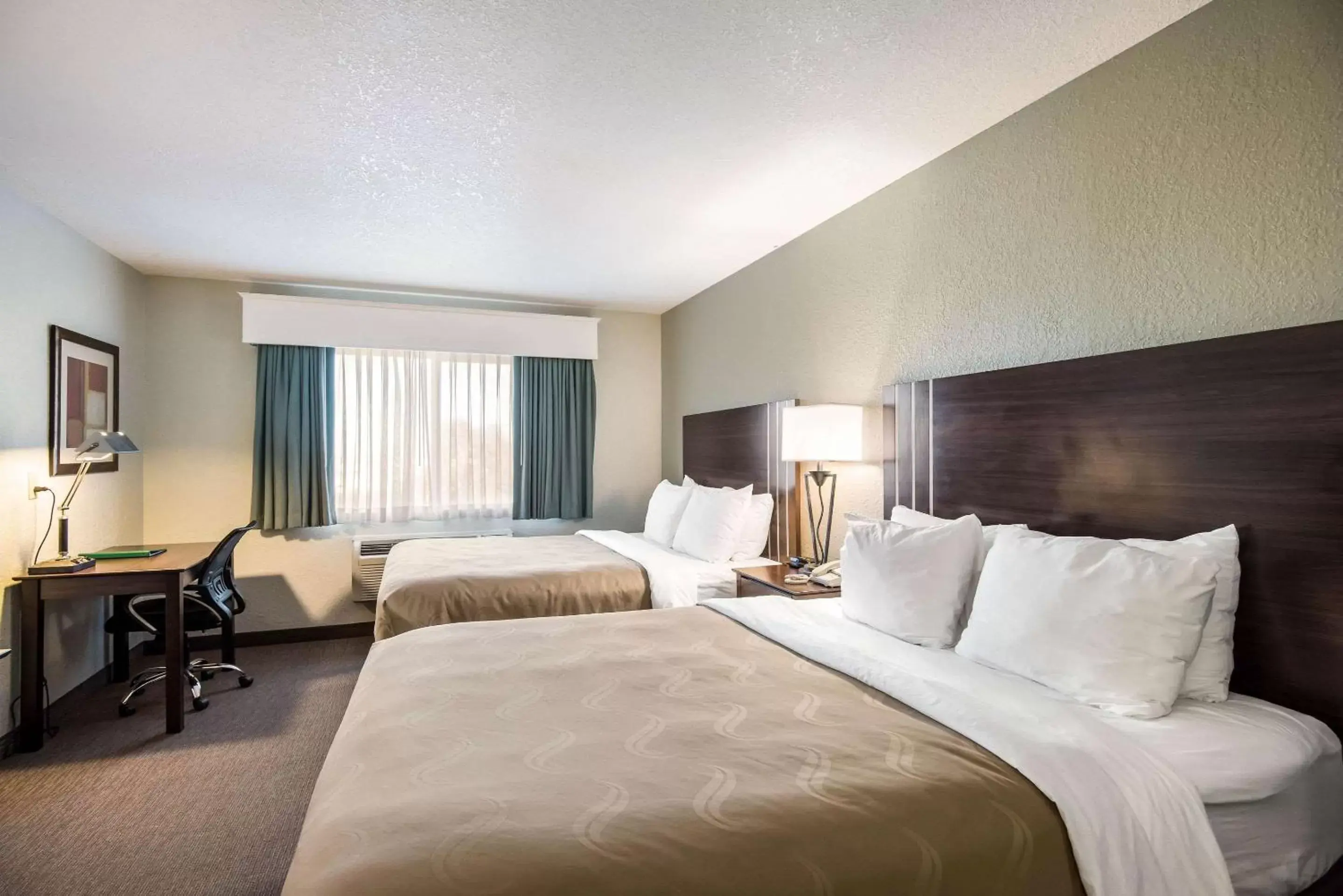 Photo of the whole room, Bed in Quality Inn & Suites West