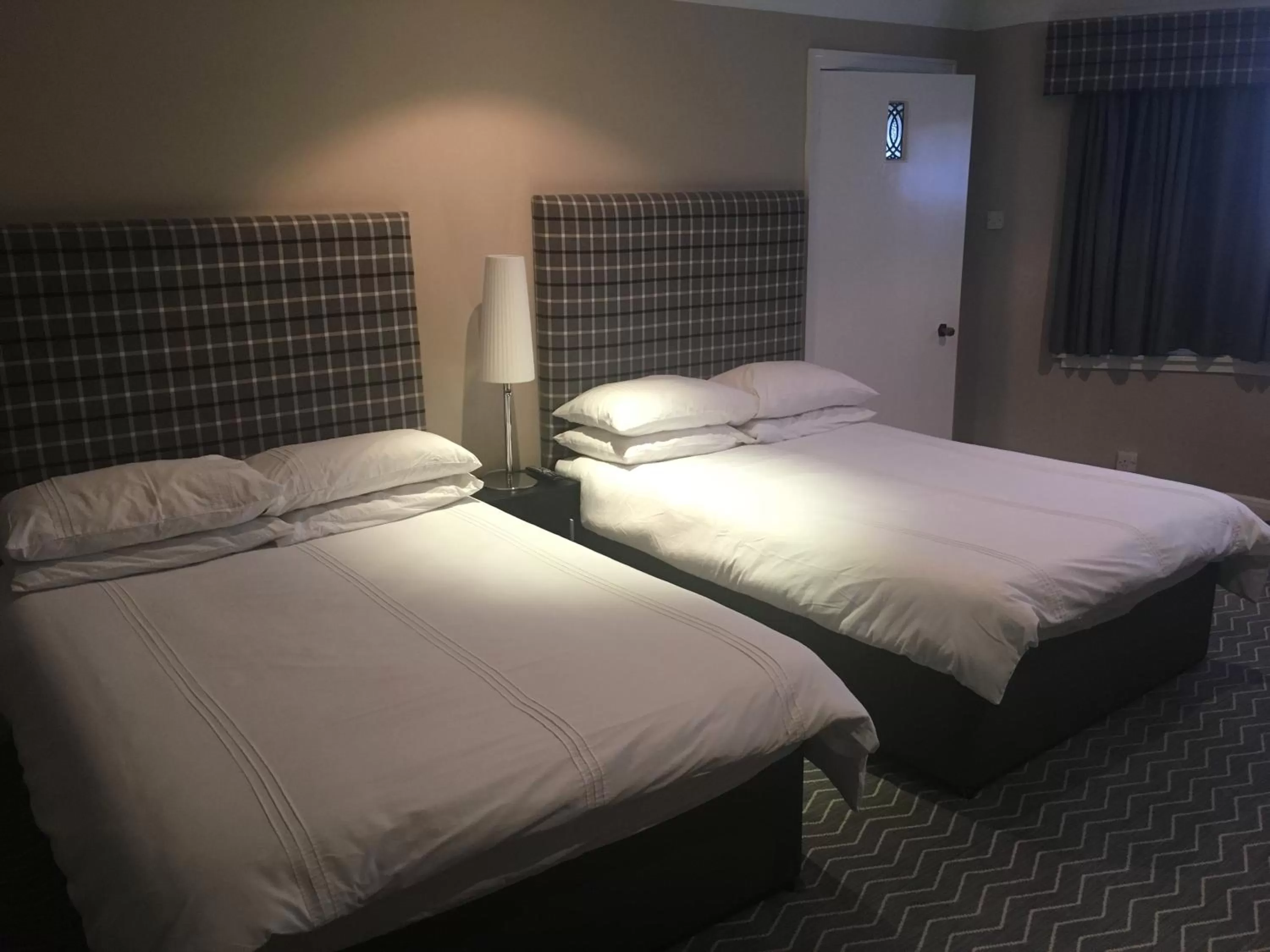 Bed in Crookston Hotel