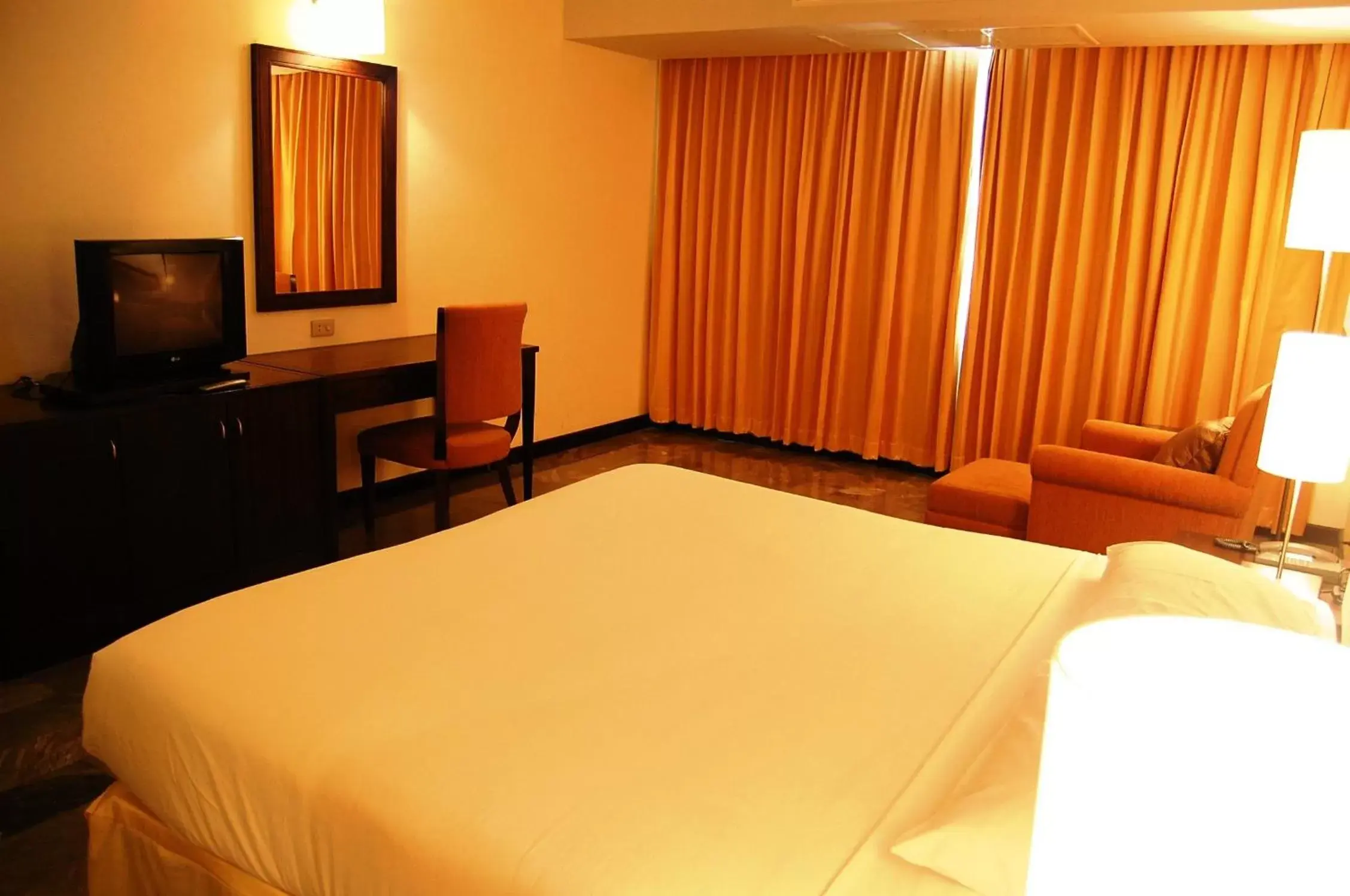 Bed in Royal Lanna Hotel