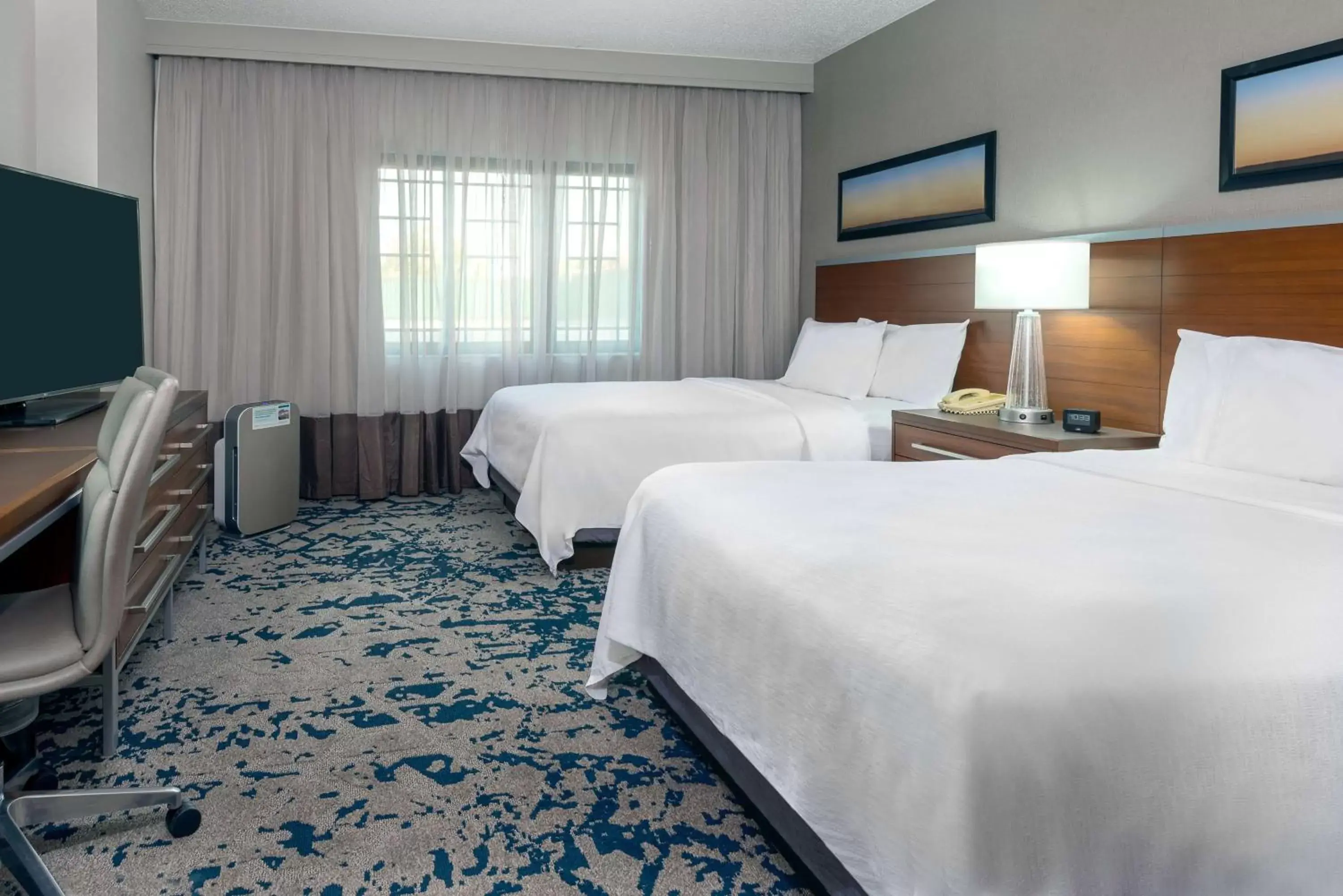 Bed in Embassy Suites by Hilton Raleigh Durham Research Triangle