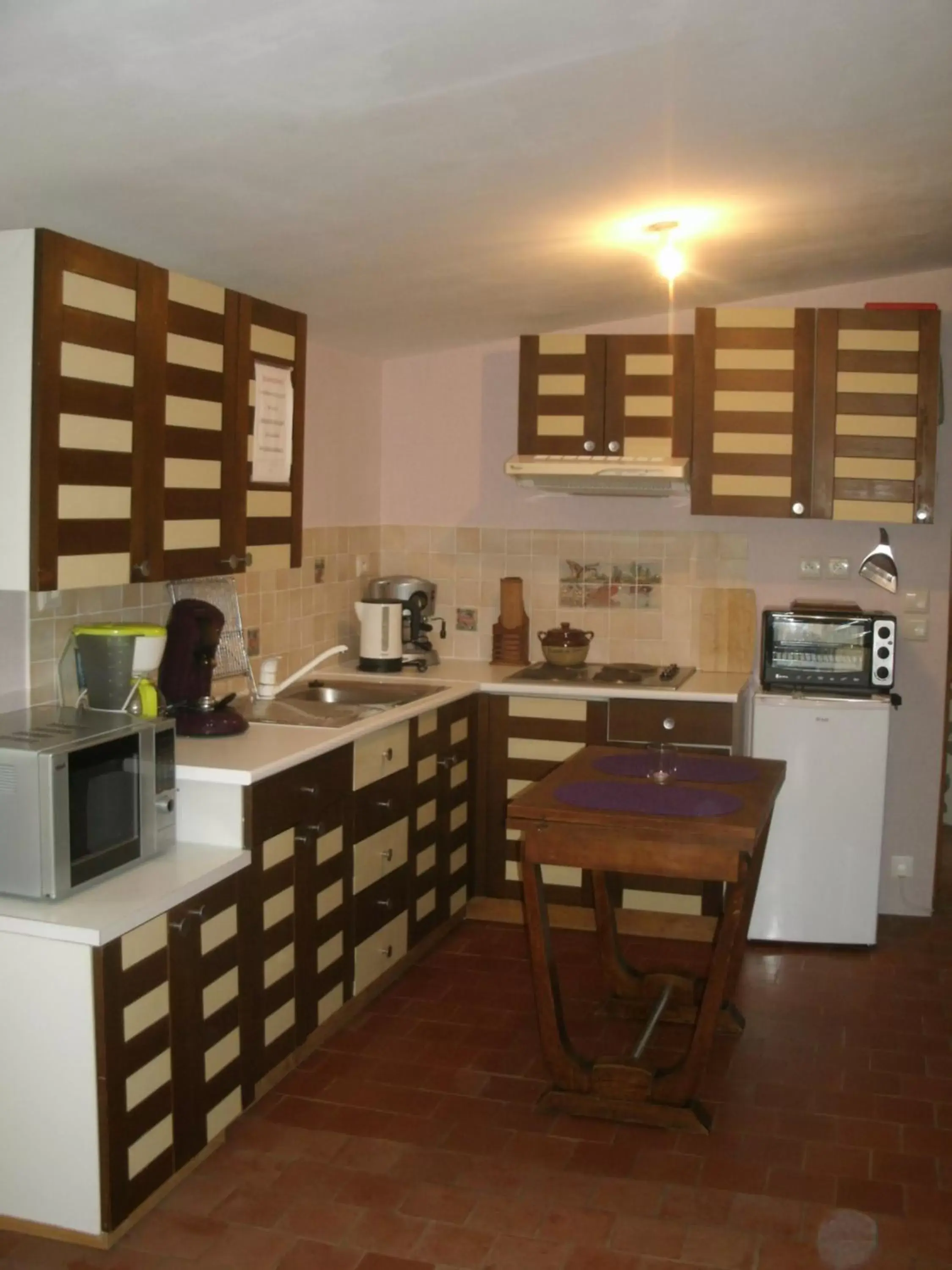 Kitchen or kitchenette in Chambres d'hotes du Moulin