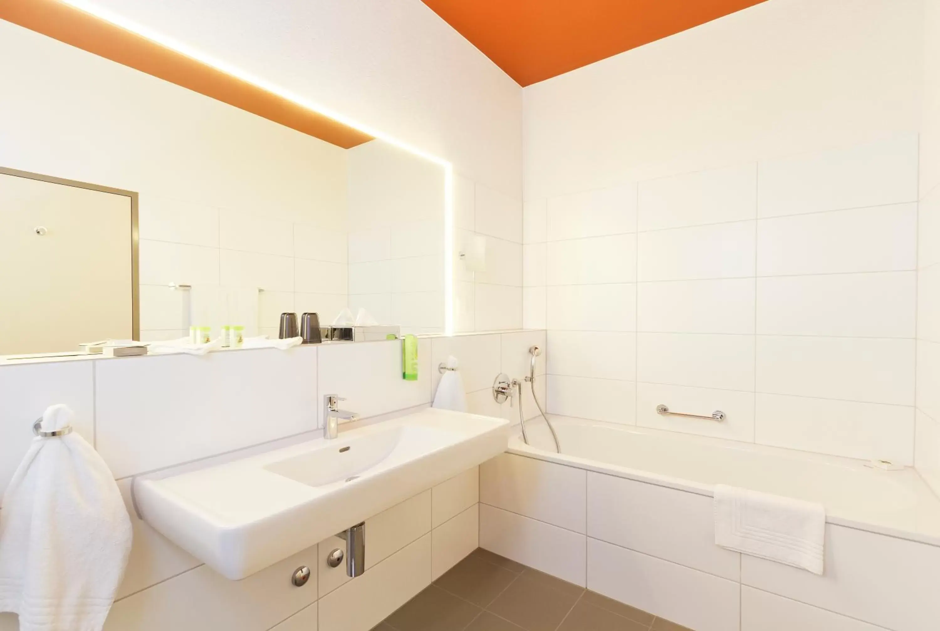 Bathroom in SwissEver Zug Swiss Quality Hotel