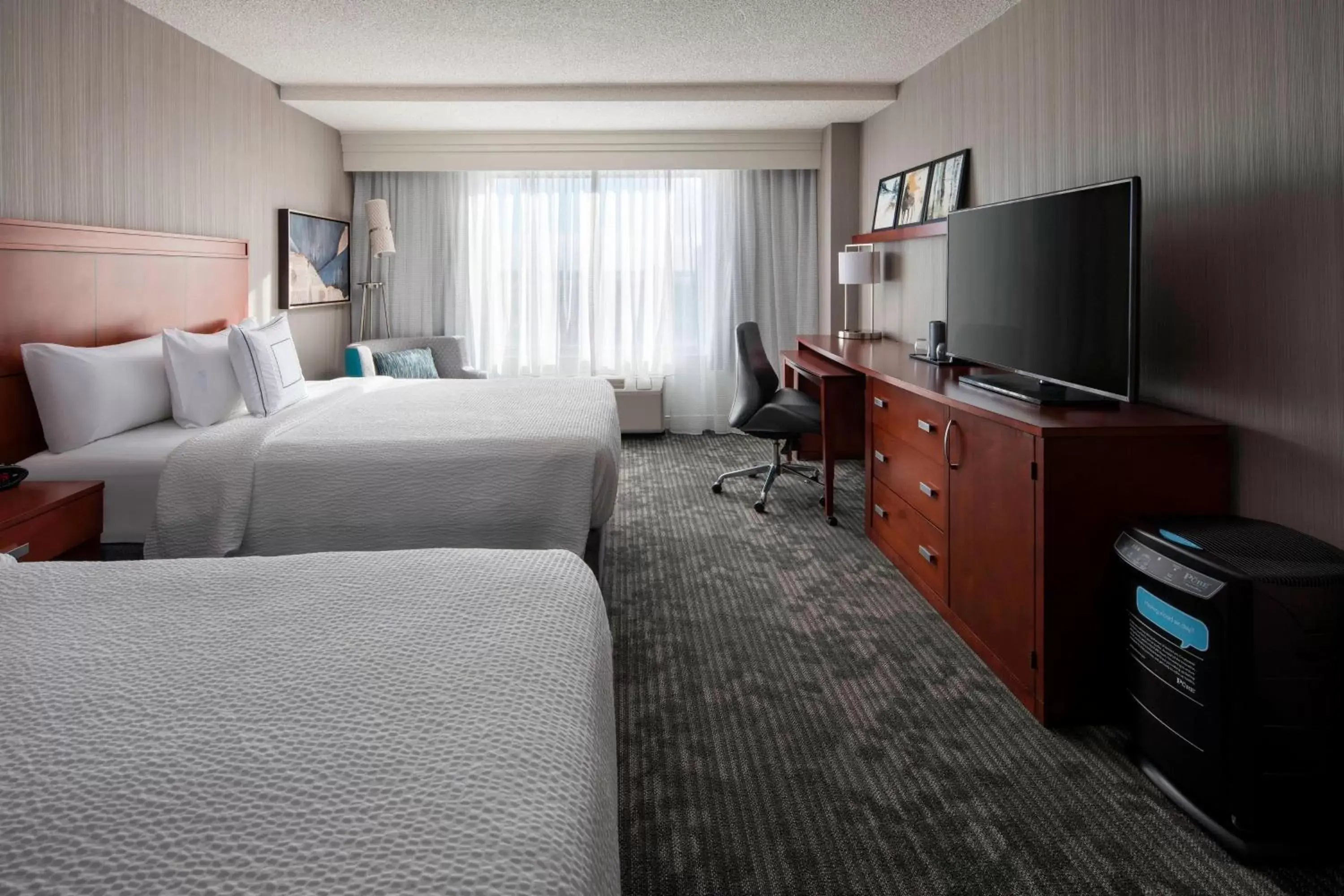Photo of the whole room, TV/Entertainment Center in Courtyard by Marriott Denver Airport