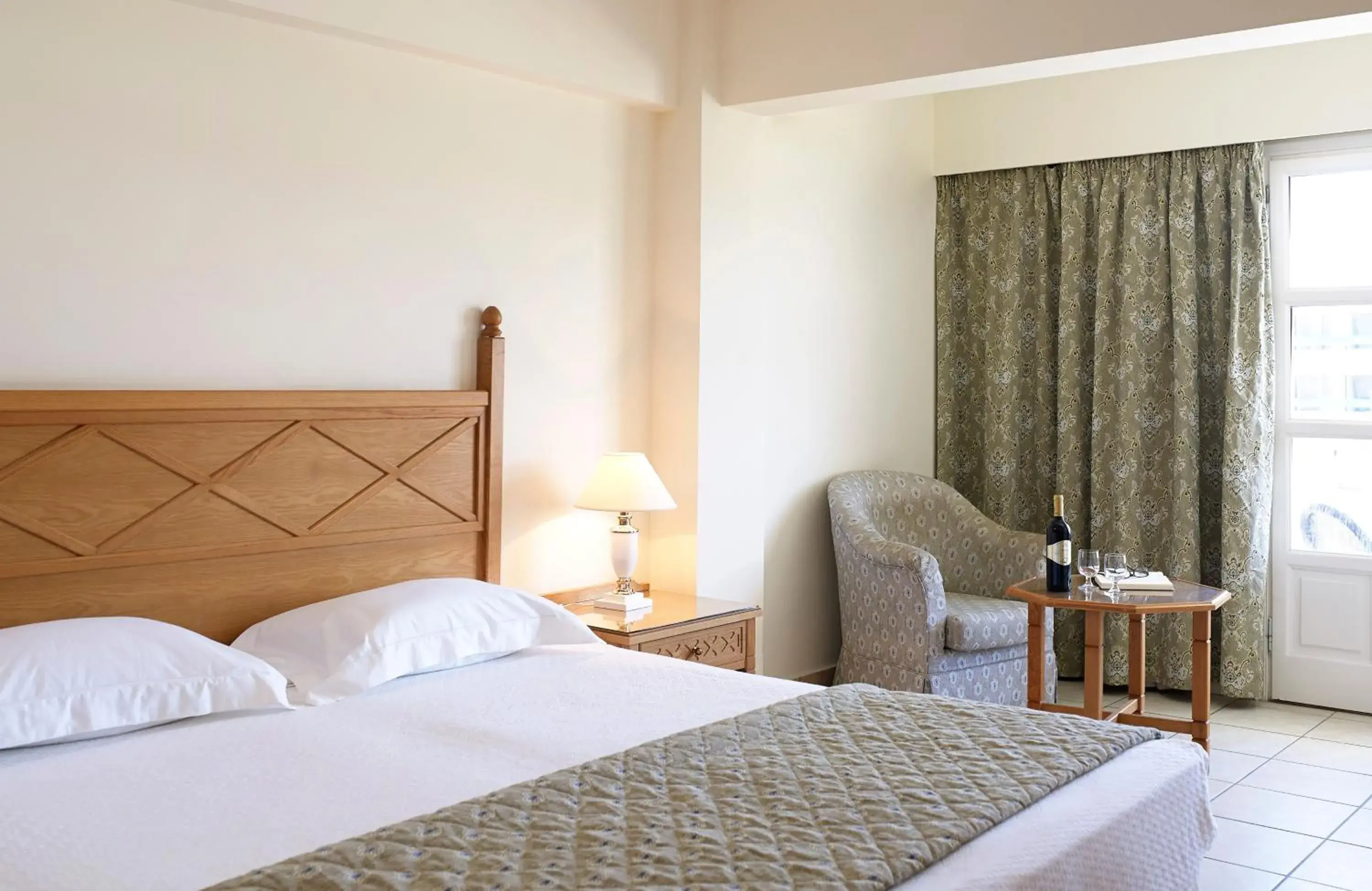 Bed in Mitsis Petit Palais Bed in Mitsis Petit Palais