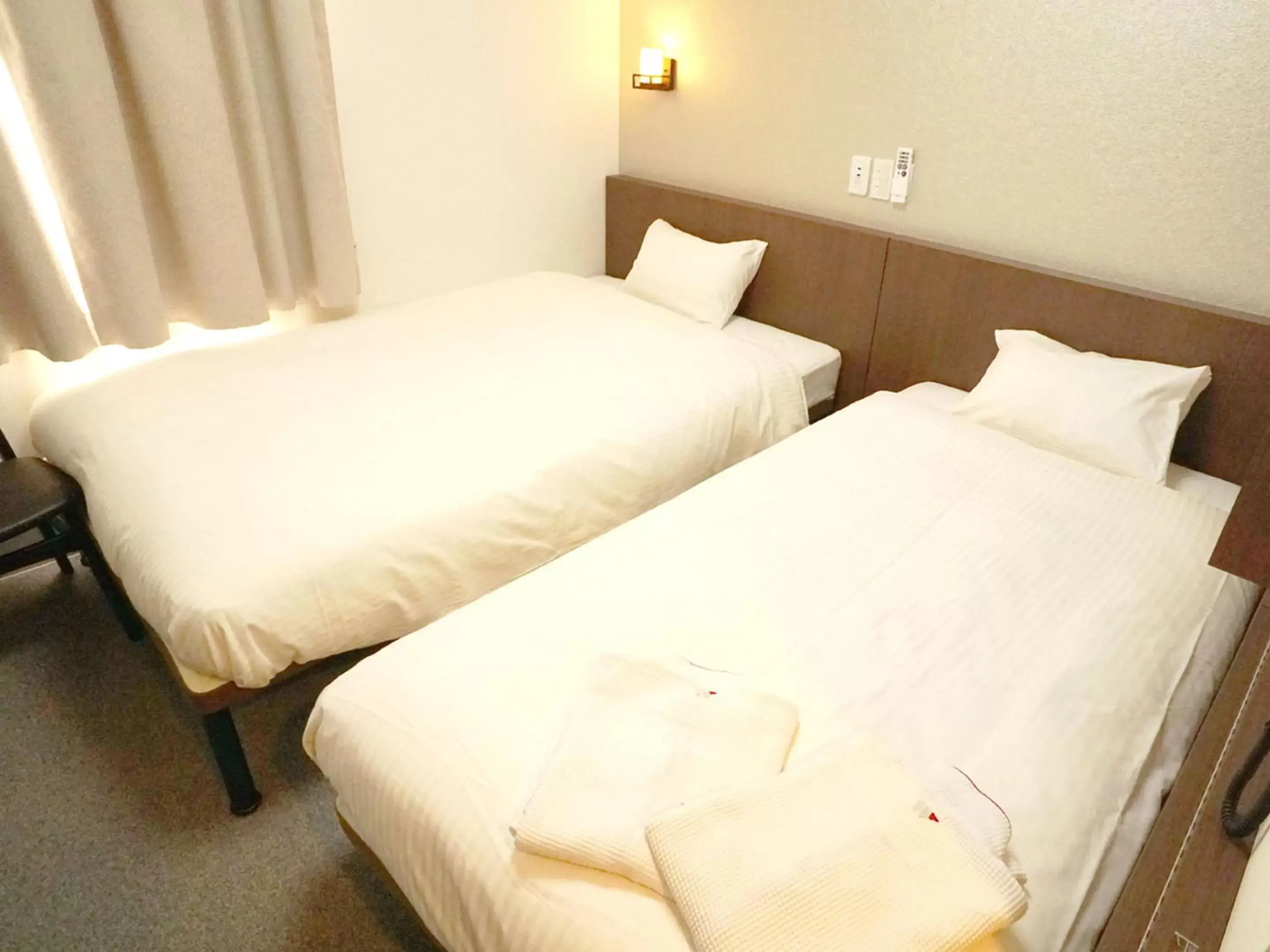 Bed in Hotel Wing International Himeji