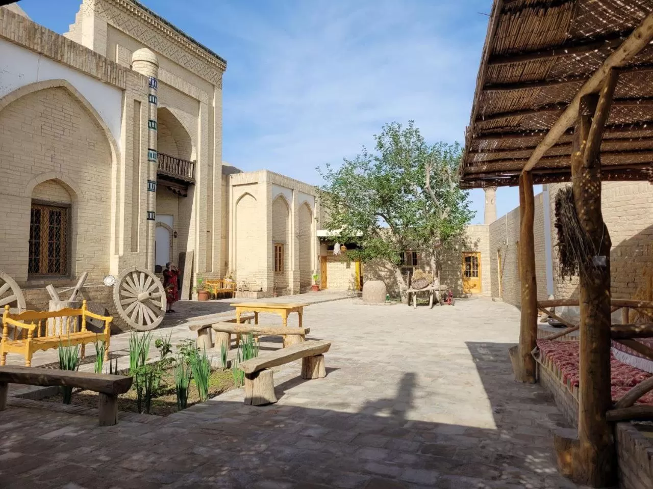 Inner courtyard view in madrasah Polvon-Qori boutique hotel XIX century