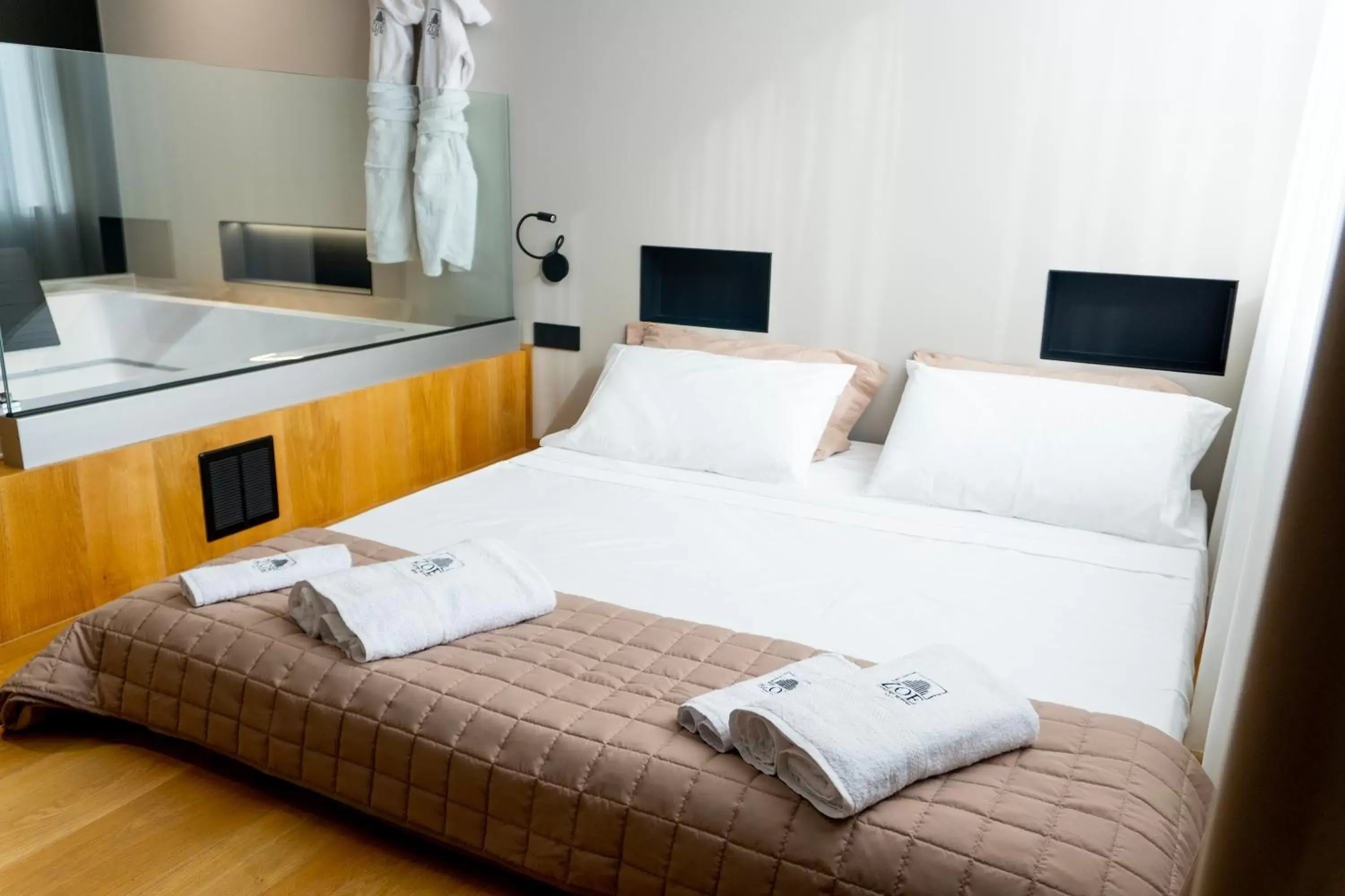 Bed in ZOE LUXURY SUITES