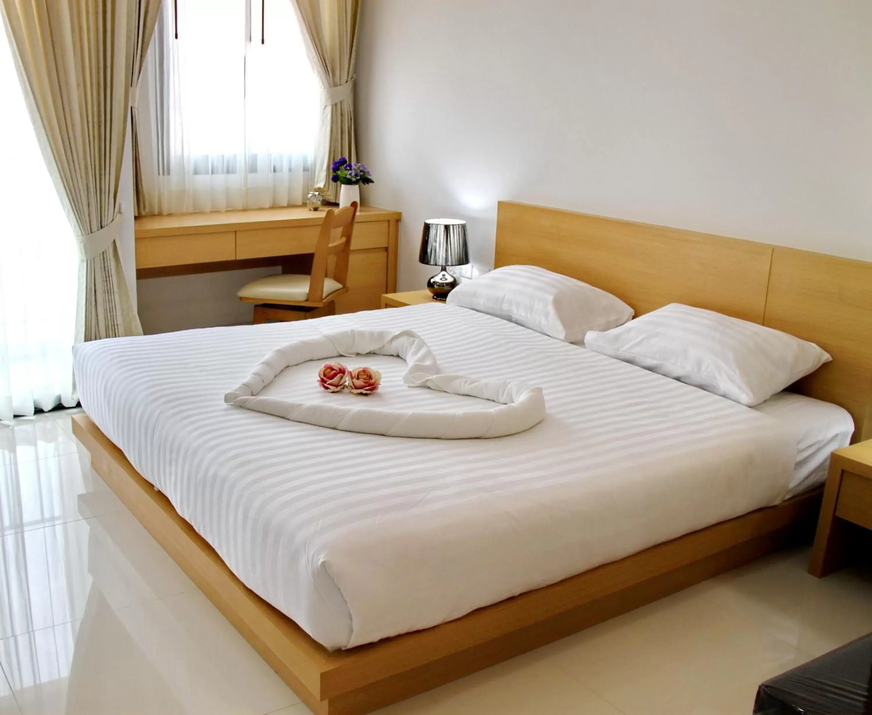 Bed in Diana Garden Resort - SHA Extra Plus