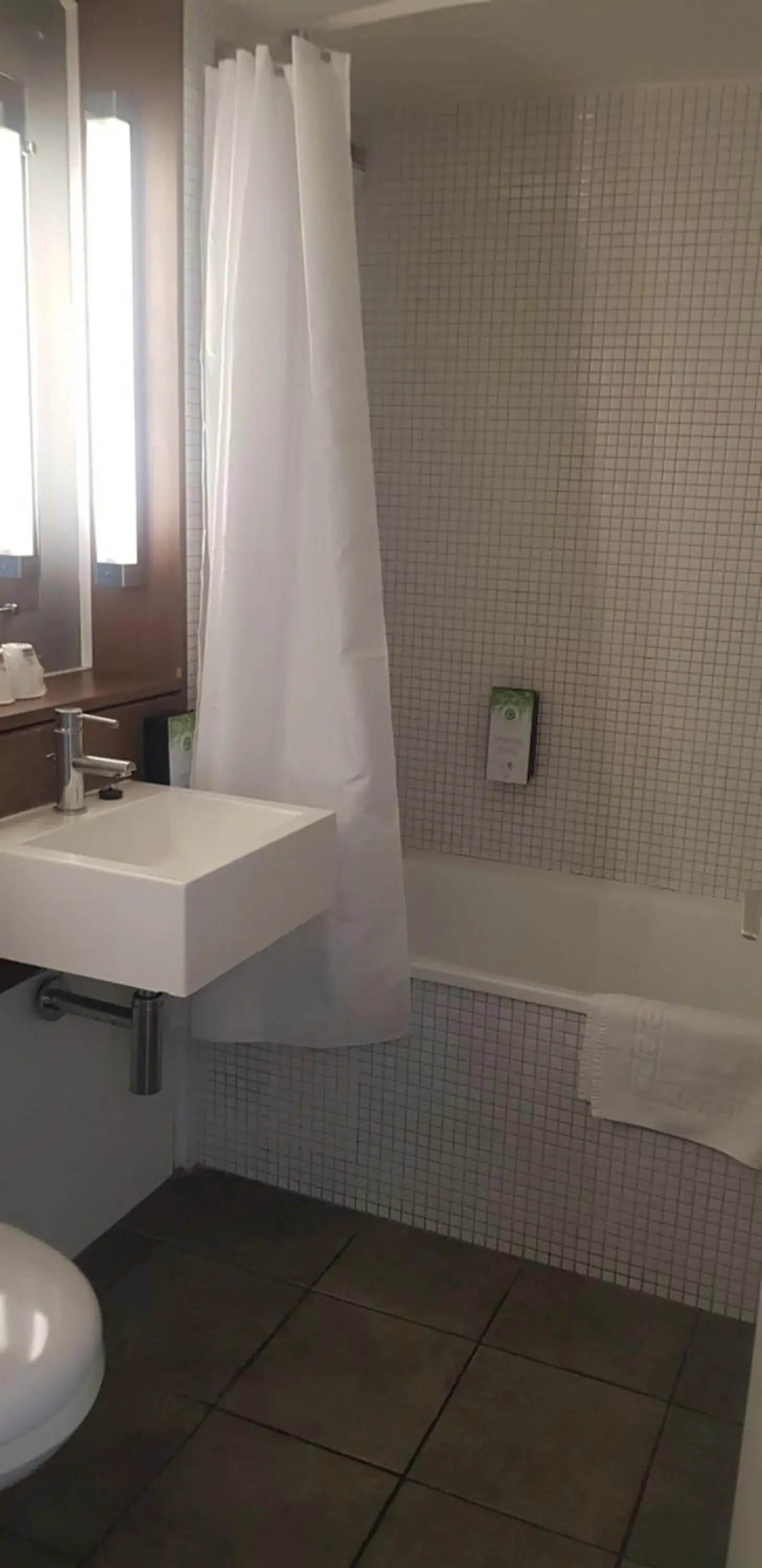 Bathroom in Campanile Hotel Chantilly