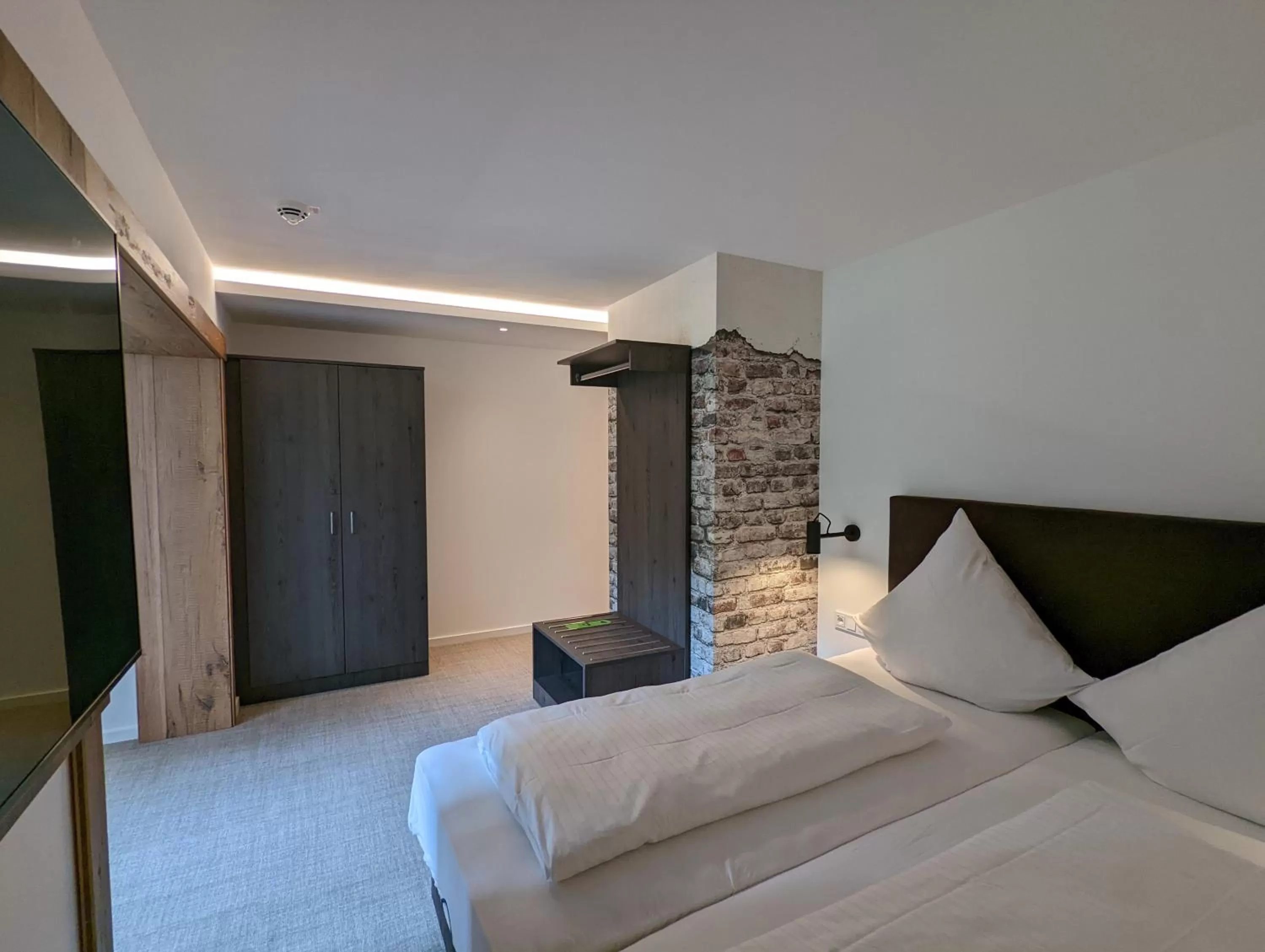 Photo of the whole room, Bed in Hotel und Weingut Karlsmühle