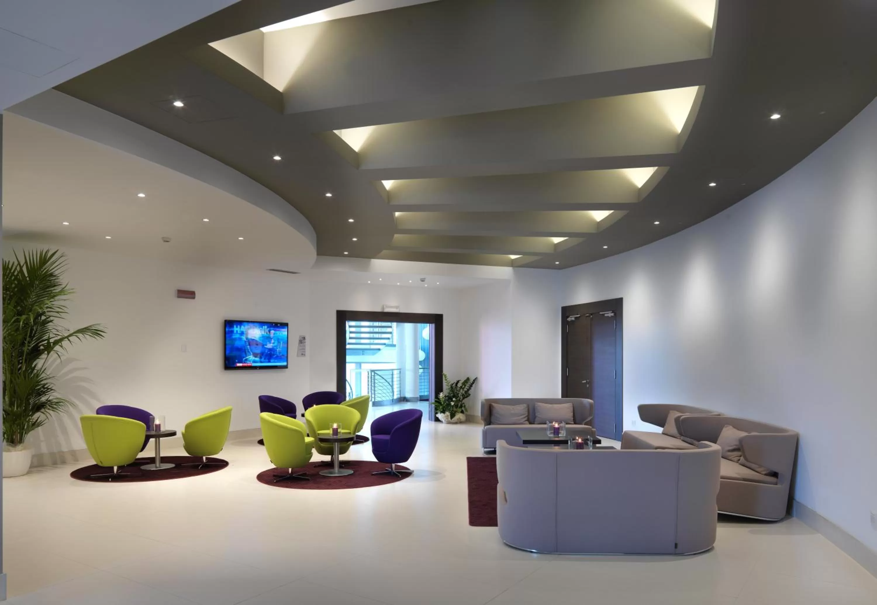 Communal lounge/ TV room in DB Hotel Verona Airport Congress & Spa