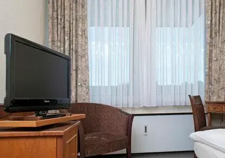 TV and multimedia, TV/Entertainment Center in Hotel am Rathaus