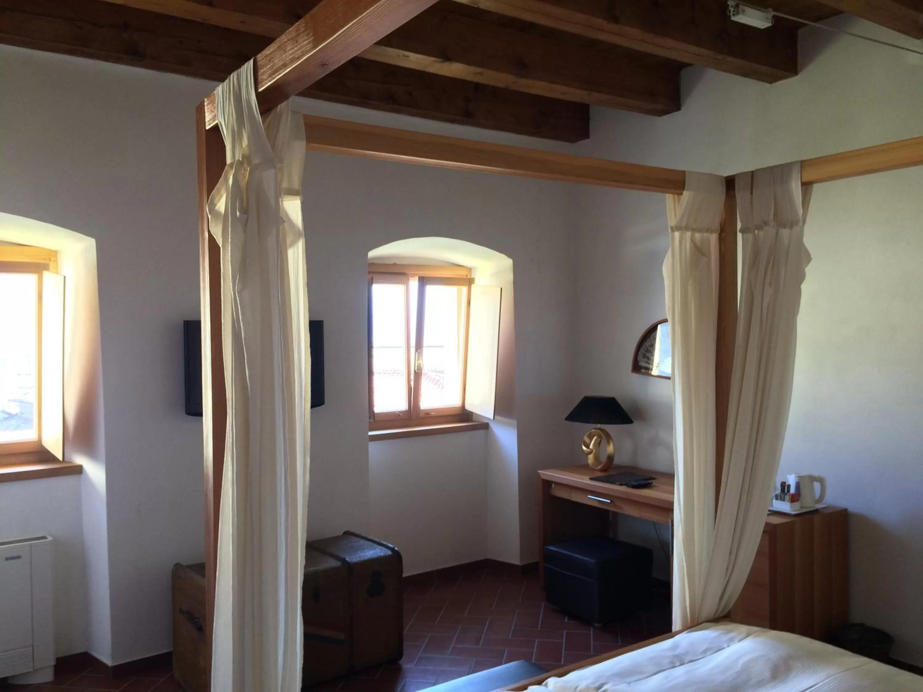 Bed in Relais Palazzo Lodron