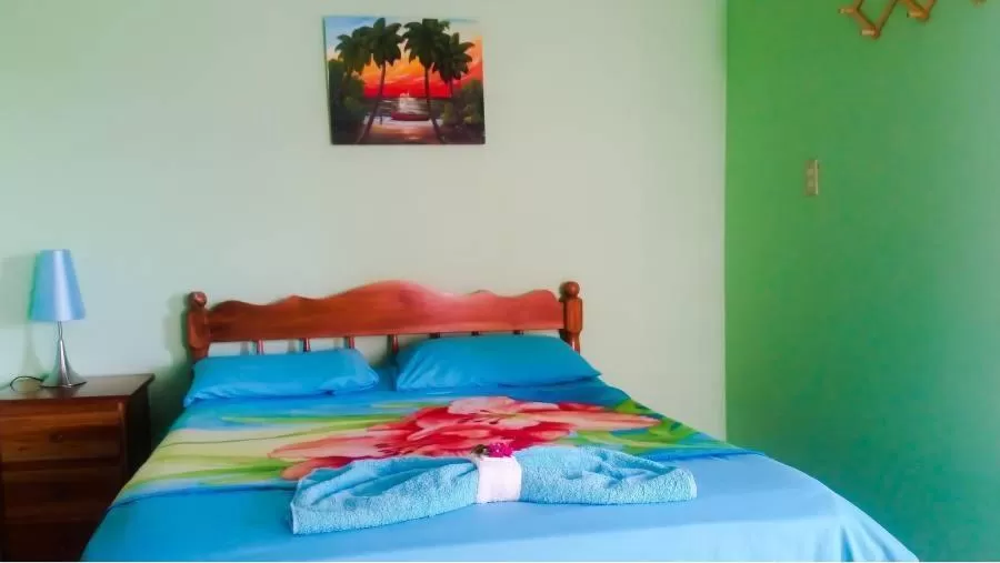 Bed in Beach Side Condos Caye Caulker by CCVH