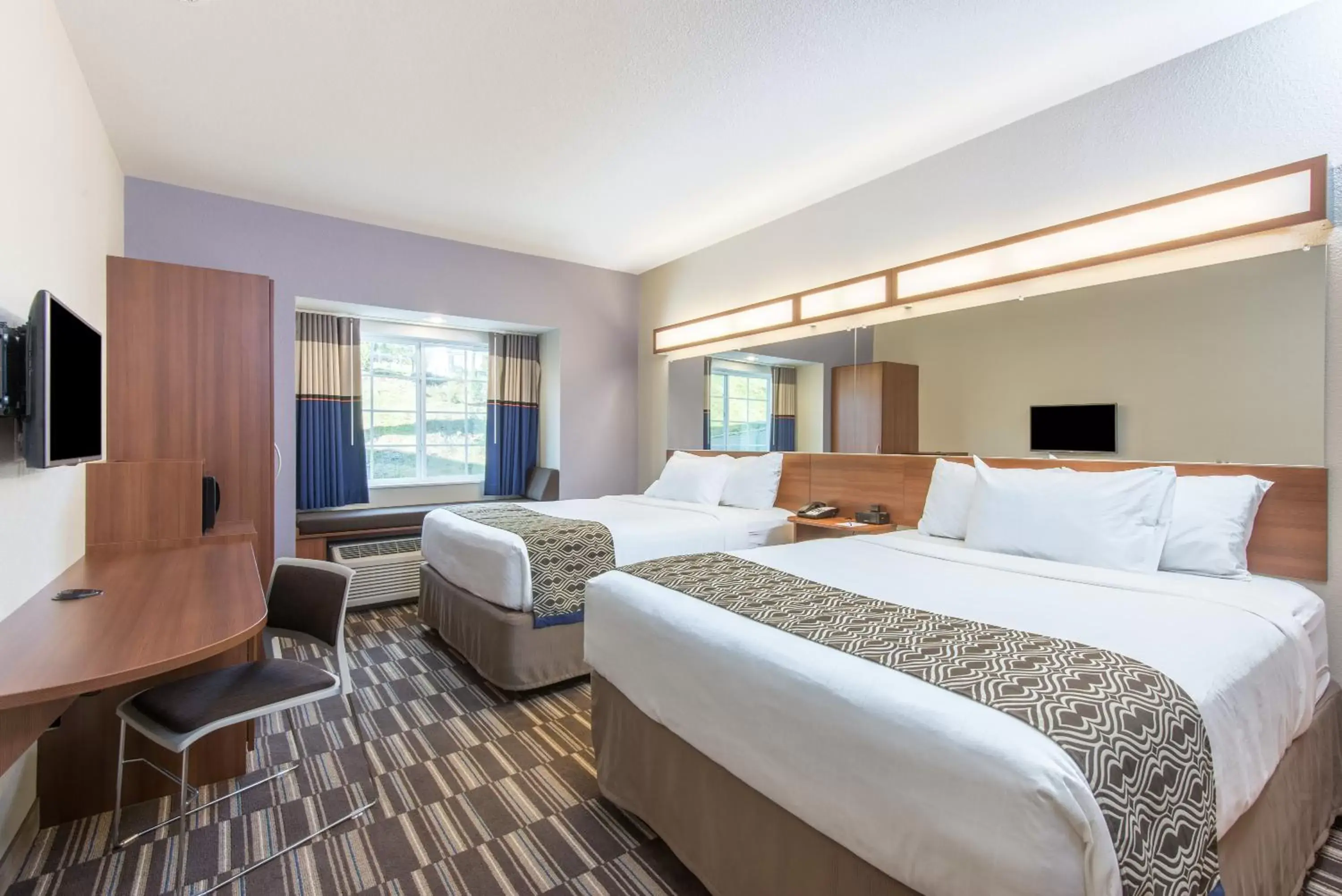 Bed in Microtel Inn & Suites by Wyndham Cadiz