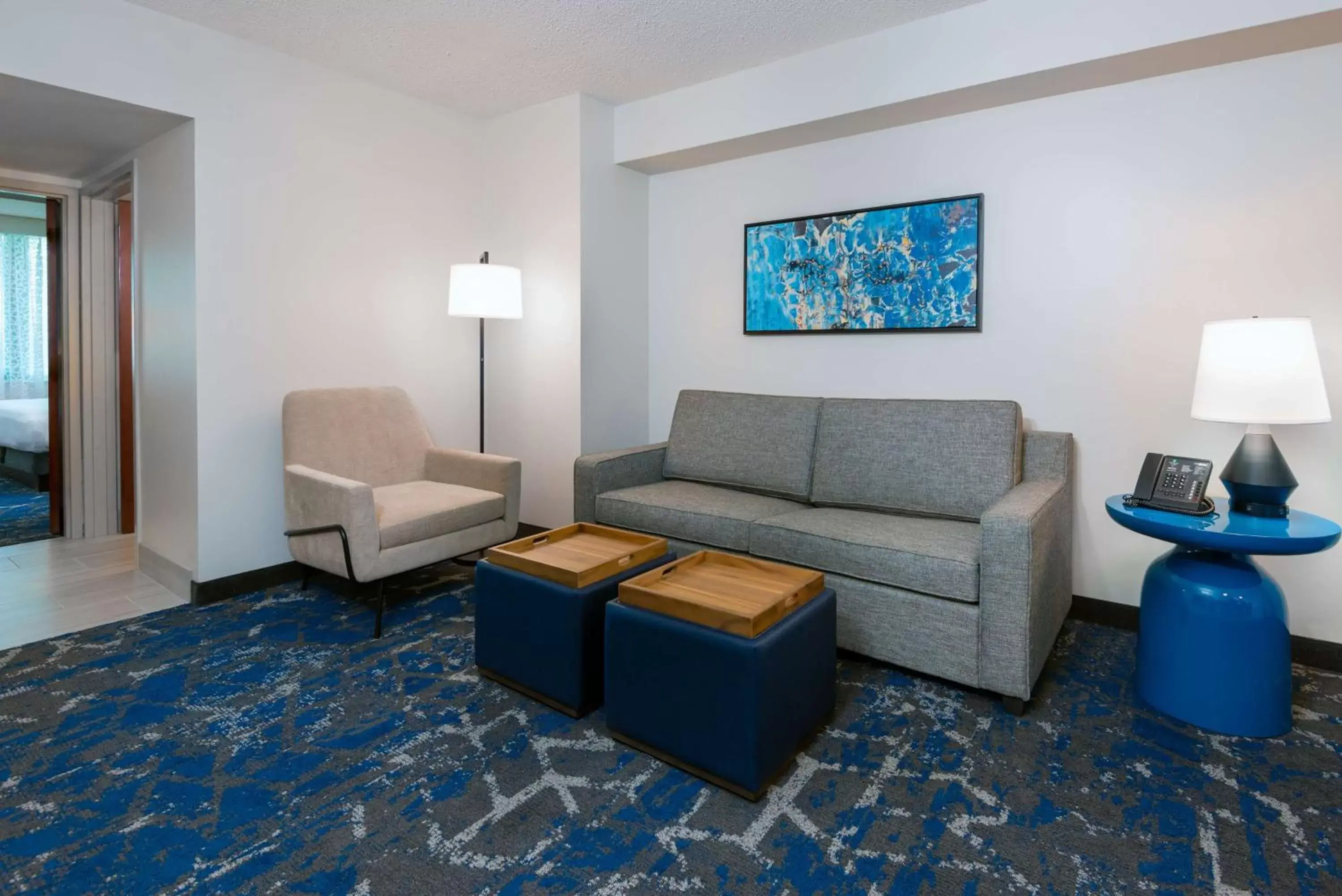 Bedroom, Seating Area in Embassy Suites by Hilton Tampa USF Near Busch Gardens