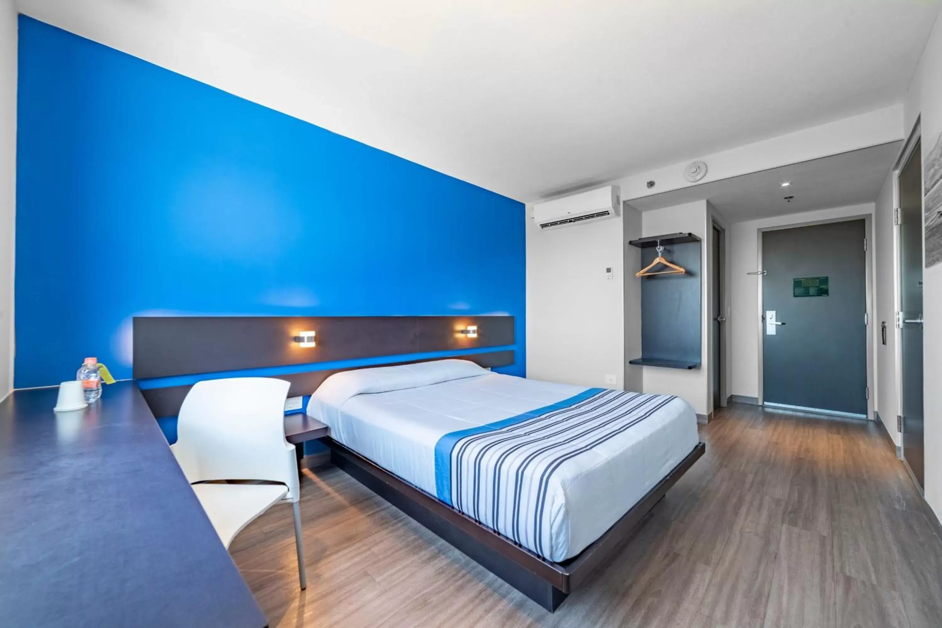 Photo of the whole room, Bed in City Express Junior by Marriott Merida Altabrisa