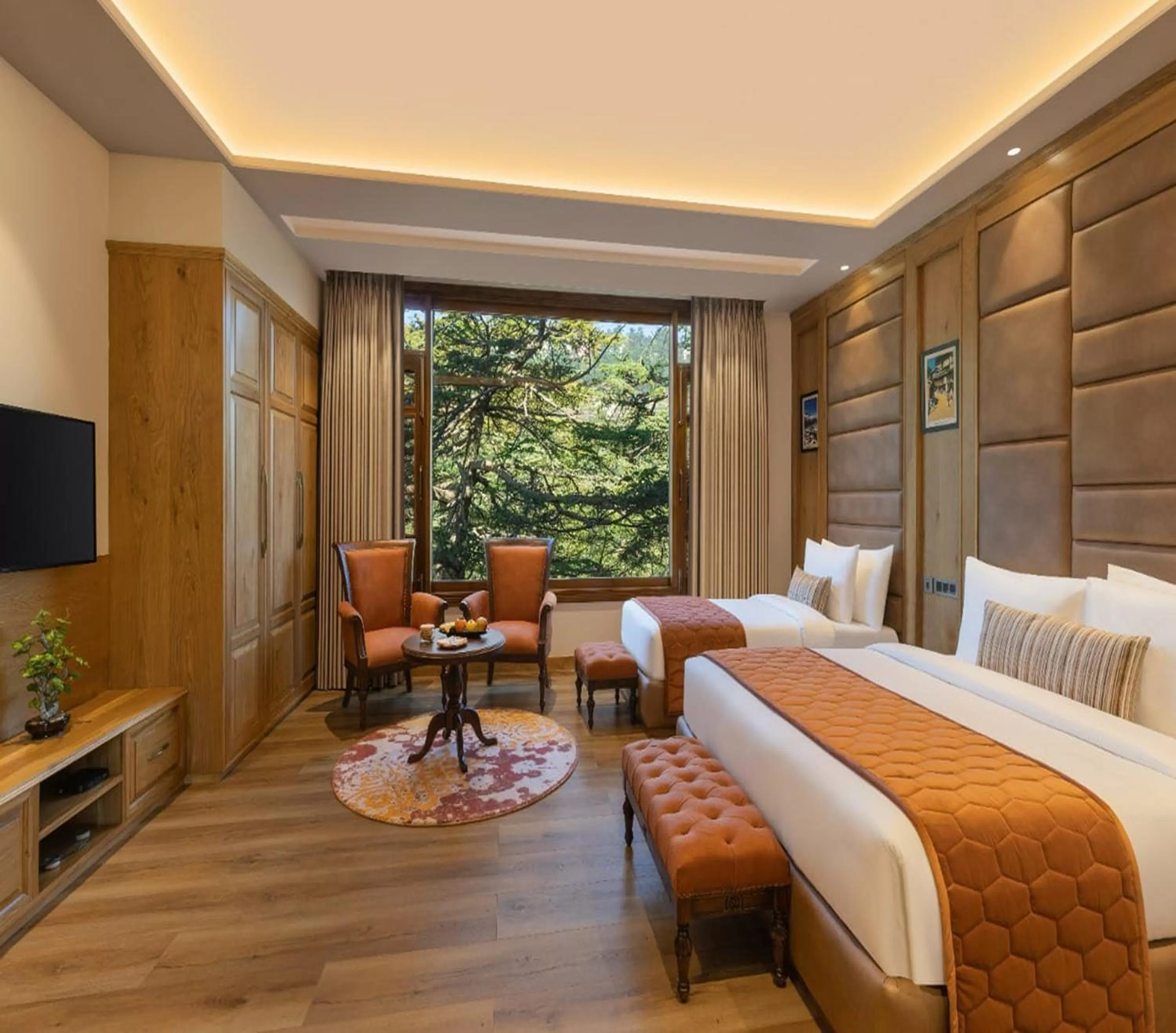 Bed in WelcomHeritage Elysium Resort & Spa