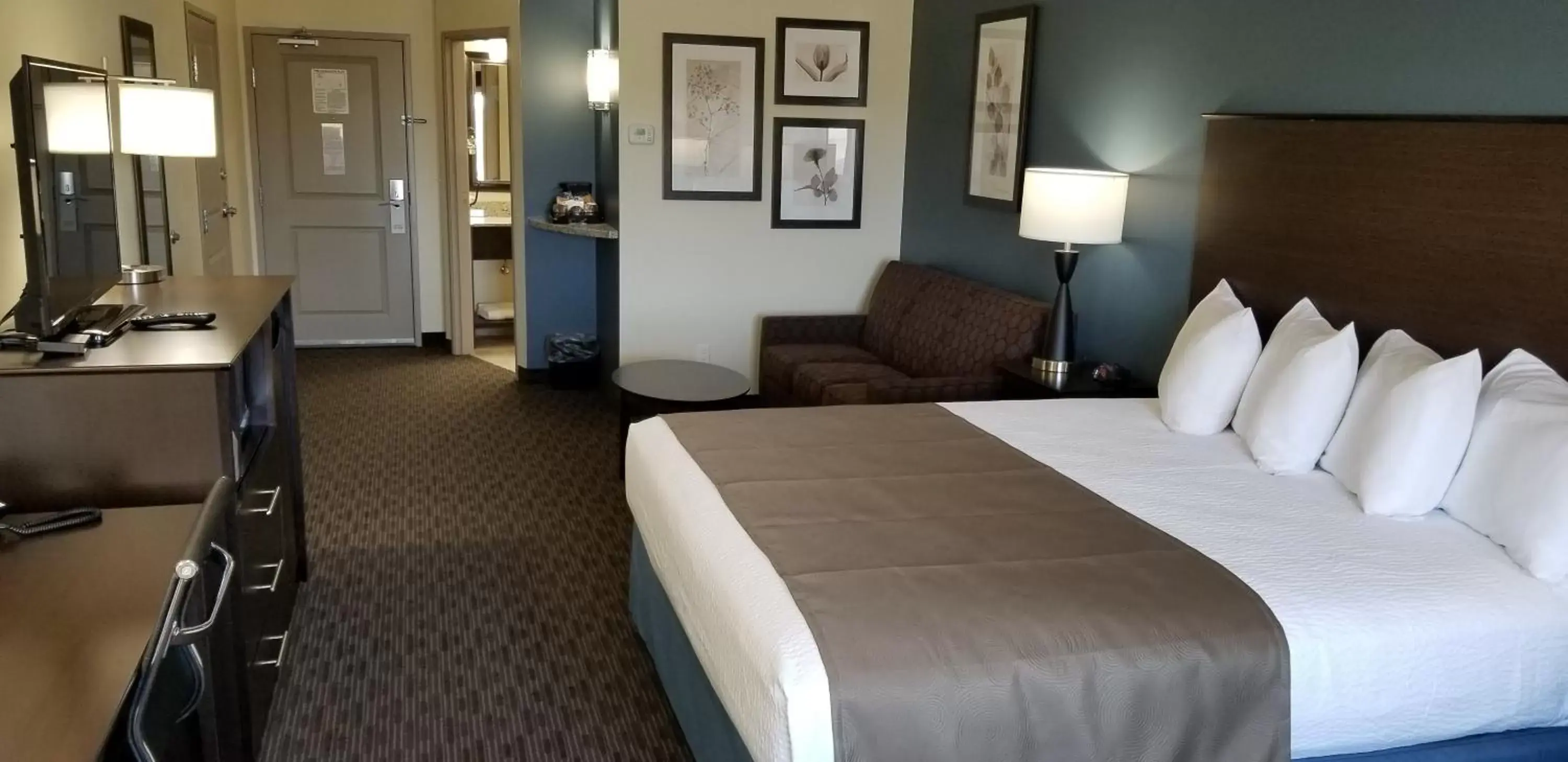 Bed in AmericInn by Wyndham Sioux Falls North