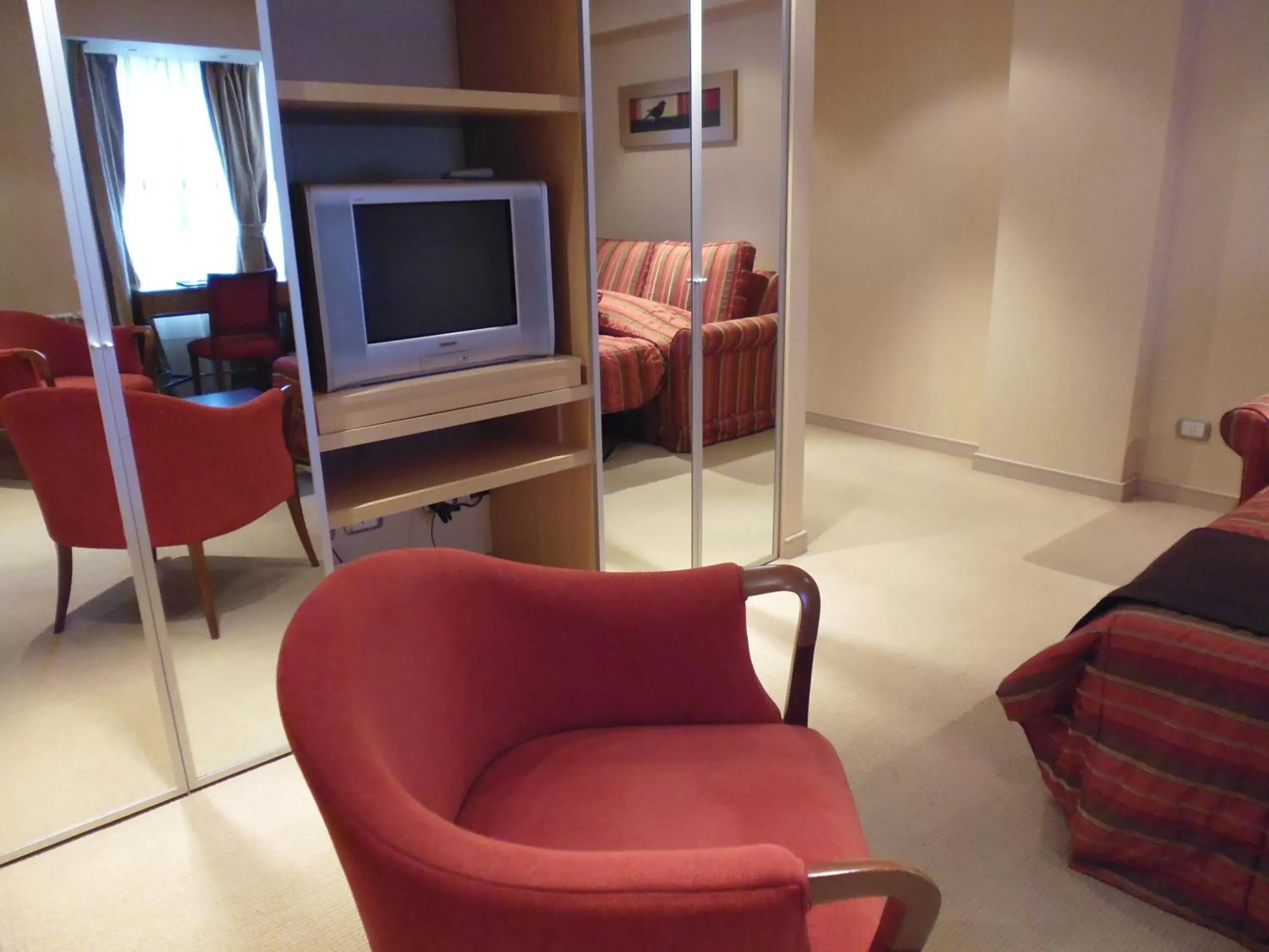 TV and multimedia, Seating Area in Fueguino Hotel