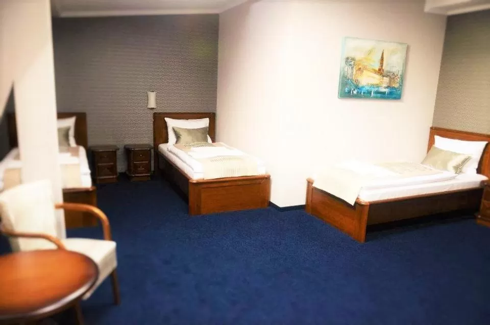 Bed in Hotel Kamienica