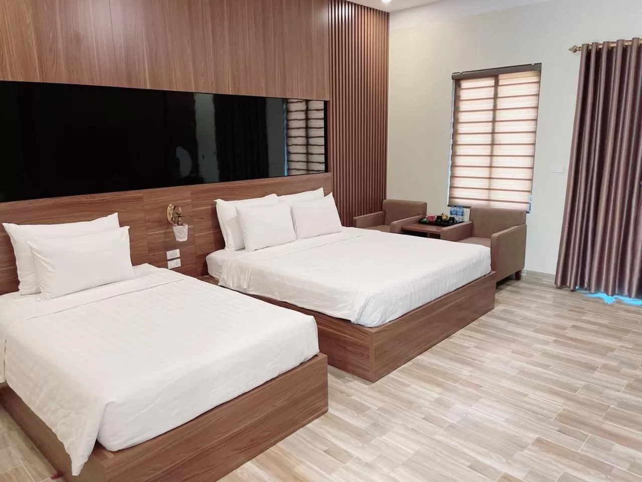 Living room, Bed in Tam Coc Holiday Hotel & Villa