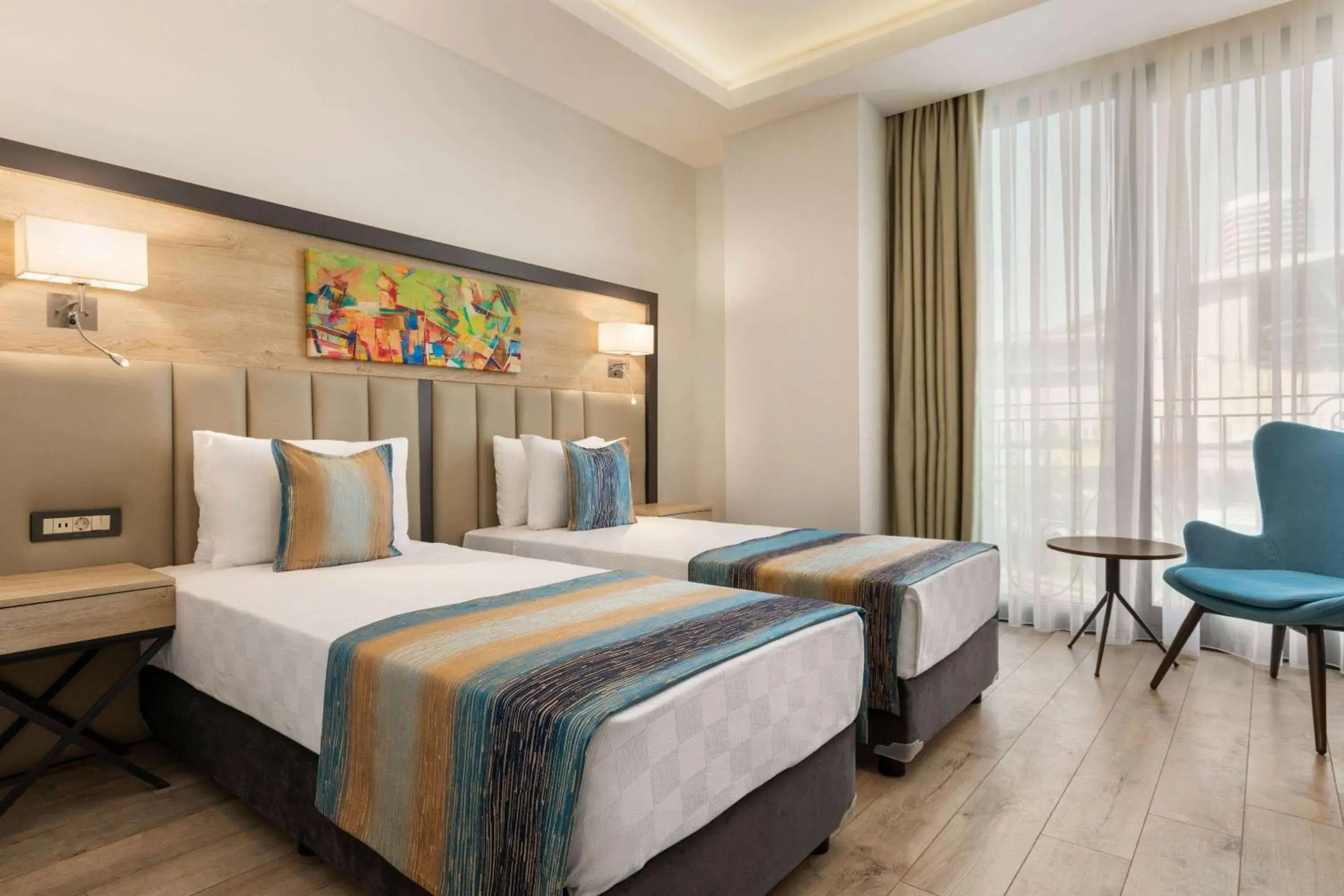Photo of the whole room, Bed in Ramada Encore By Wyndham Istanbul Basin Express