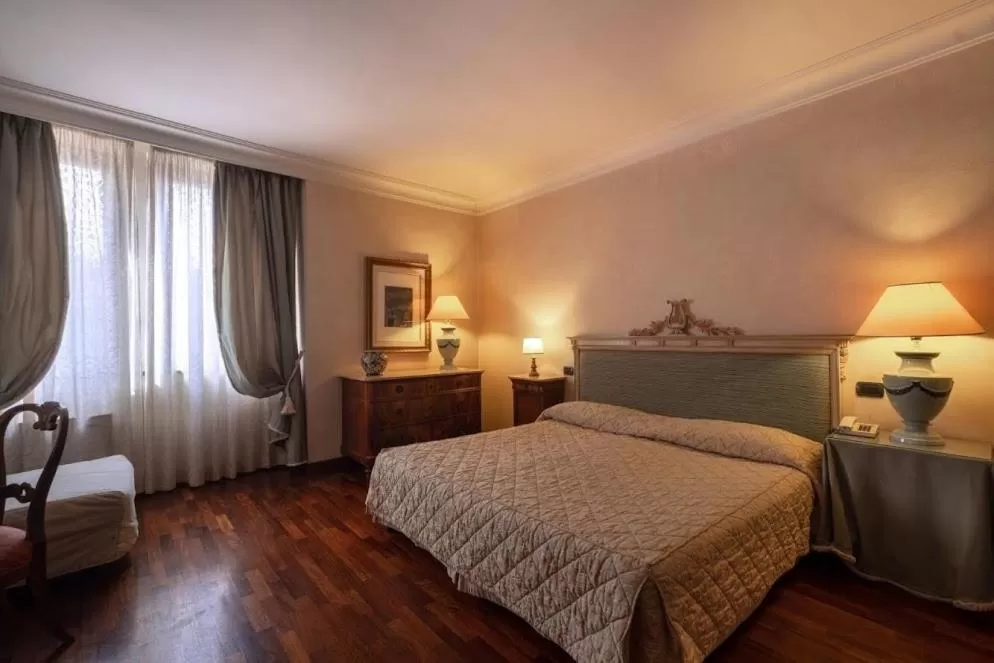 Photo of the whole room, Bed in Relais Ducale