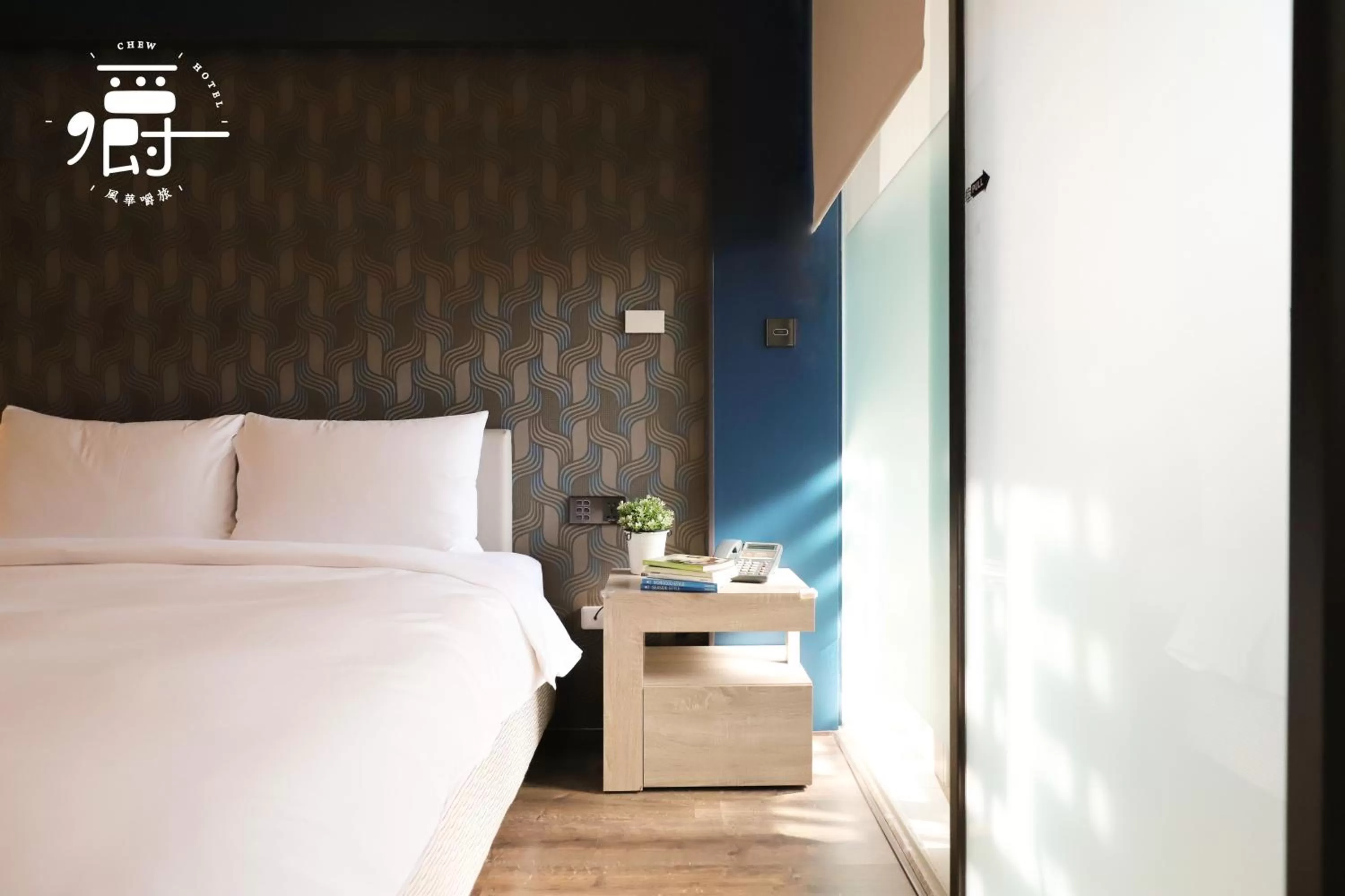 Bed in Aroma Chew Hotel