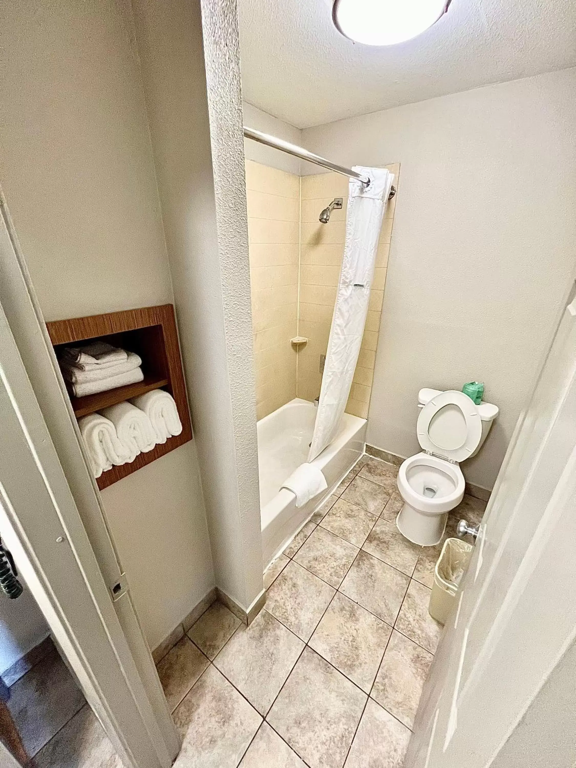 Shower, Bathroom in Days Inn & Suites by Wyndham Arlington Near Six Flags