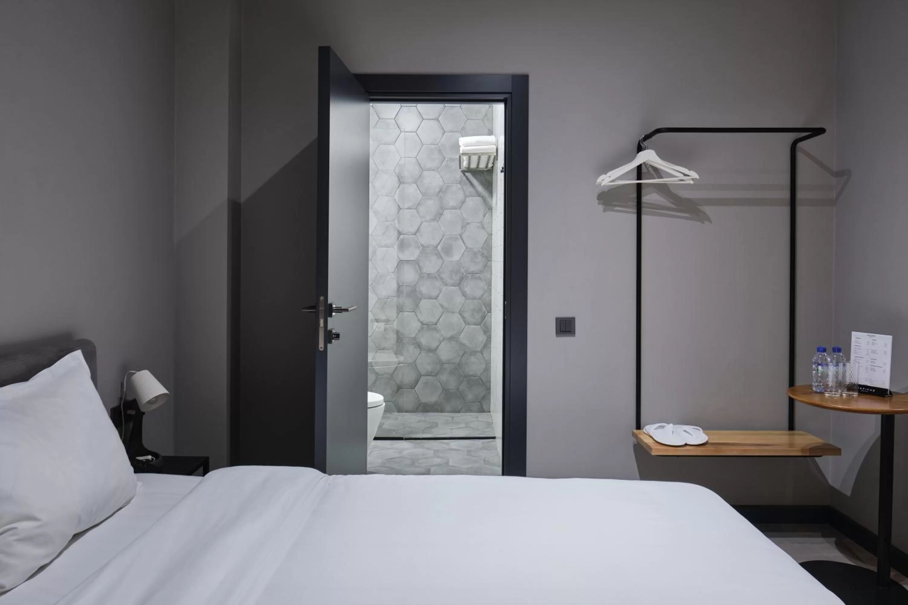 Bed in Sapiens Hotel