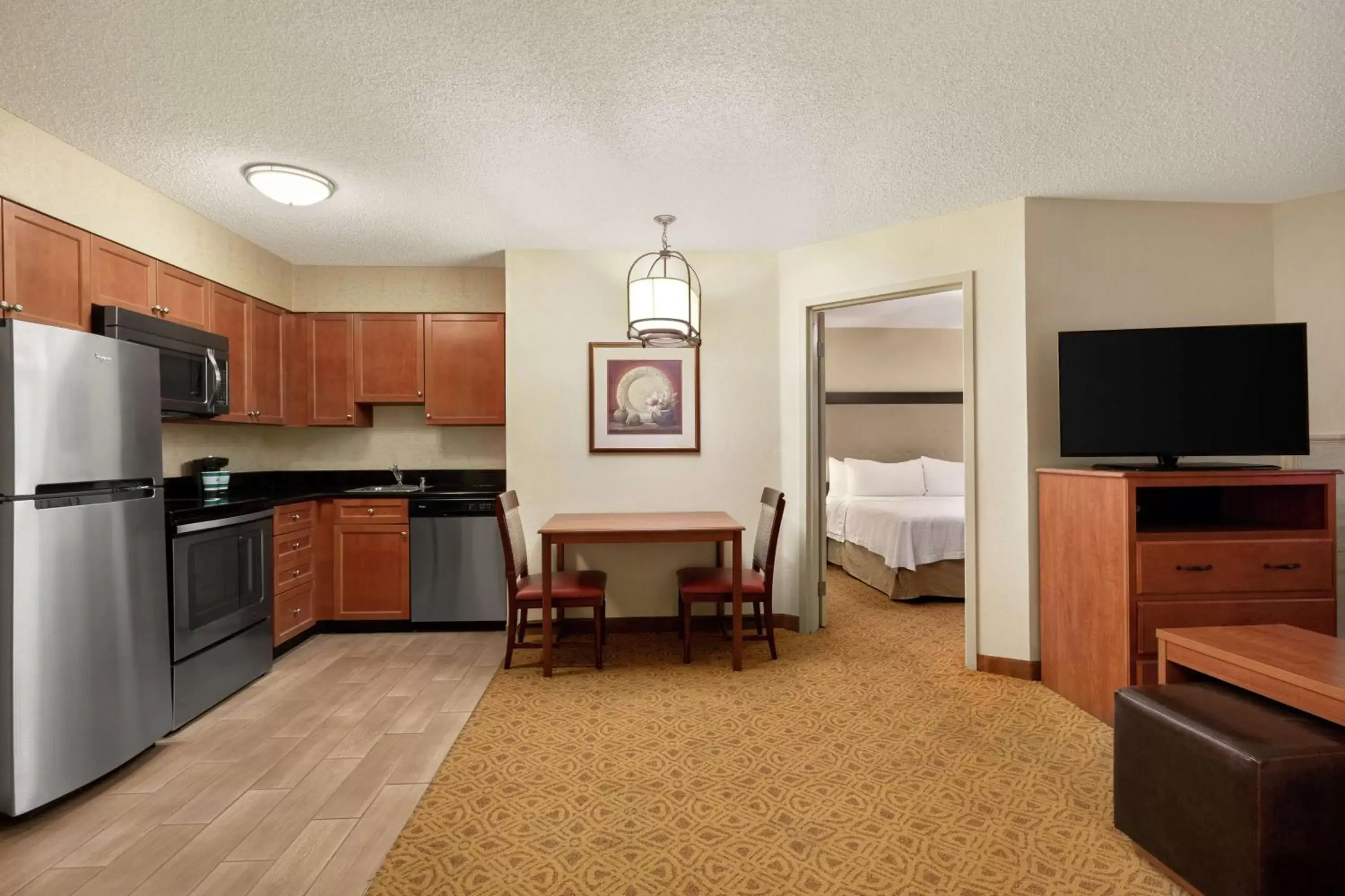 Bedroom, Kitchen/Kitchenette in Homewood Suites by Hilton Dallas-Park Central Area