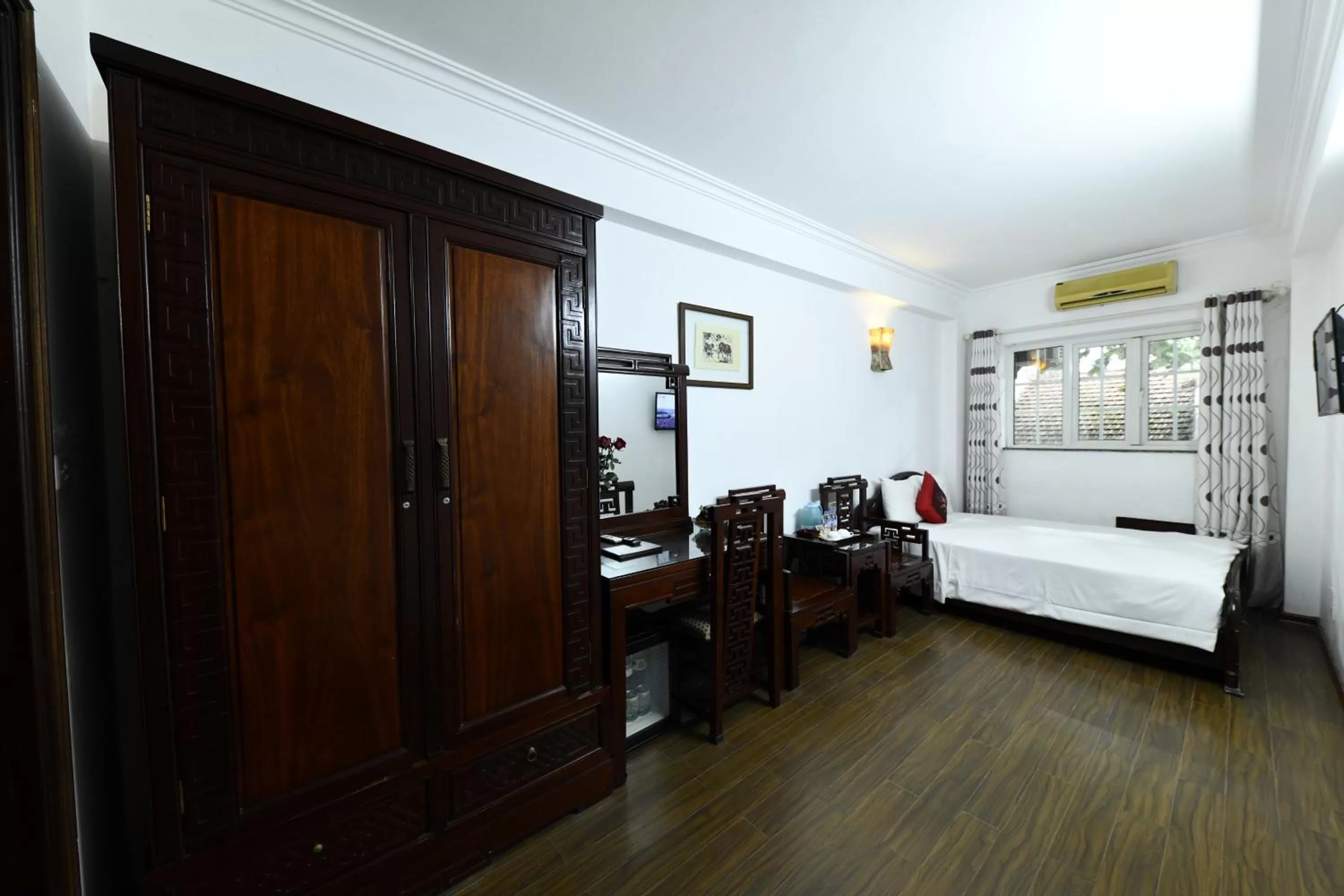 Bed in Phoenix Legend Hotel Hanoi