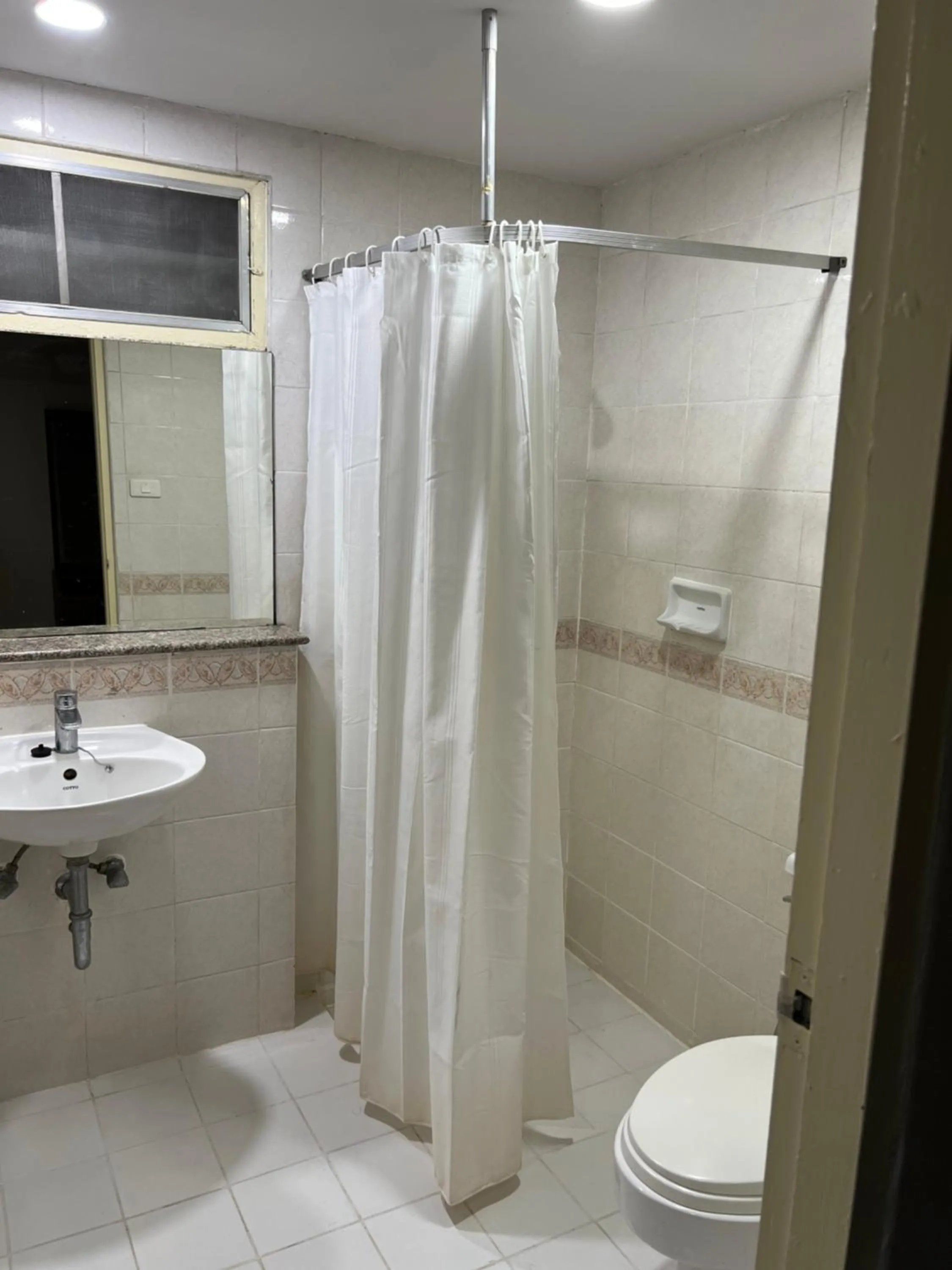 Bathroom in Mall Suites Hotel