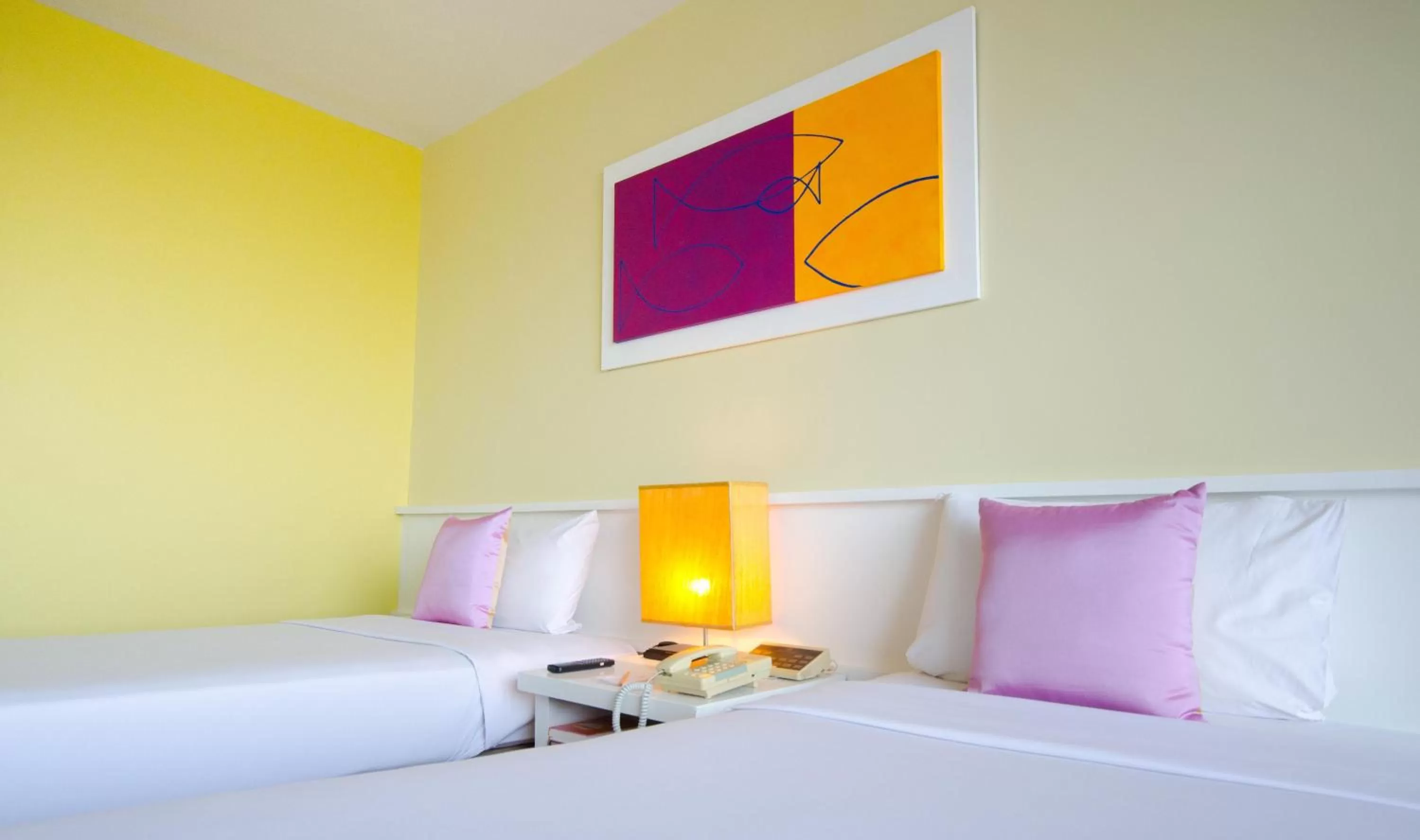 Bed in Tongtara Riverview Hotel