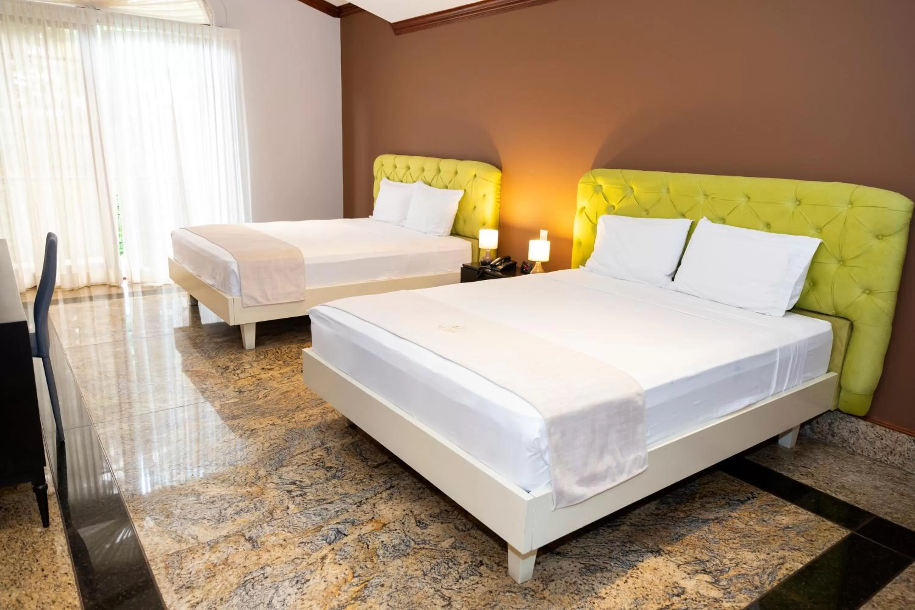 Bed in Luxva Hotel Boutique
