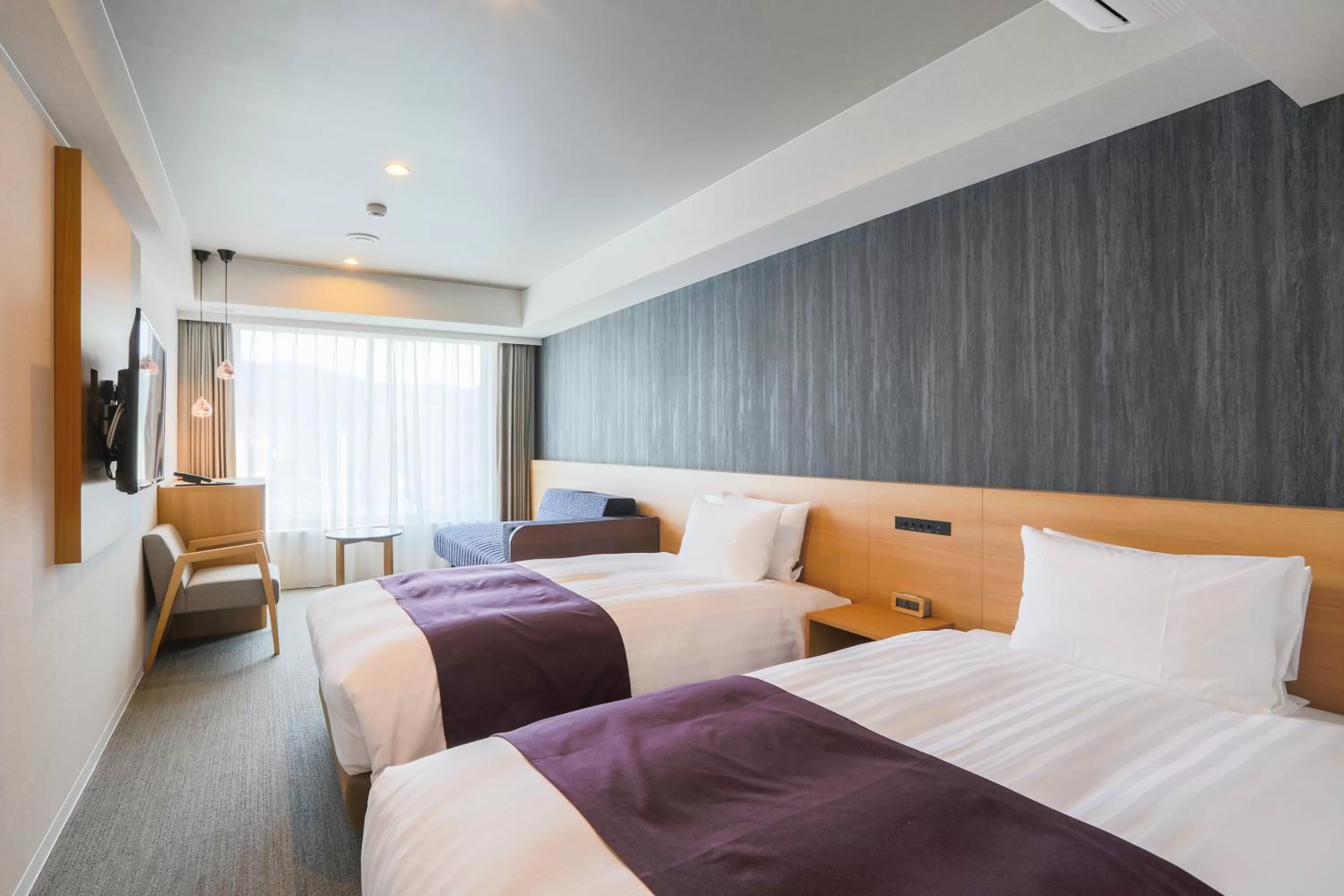 Photo of the whole room, Bed in KOKO HOTEL Kyoto Sanjo - formerly Hotel Wing International Premium Kyoto Sanjo