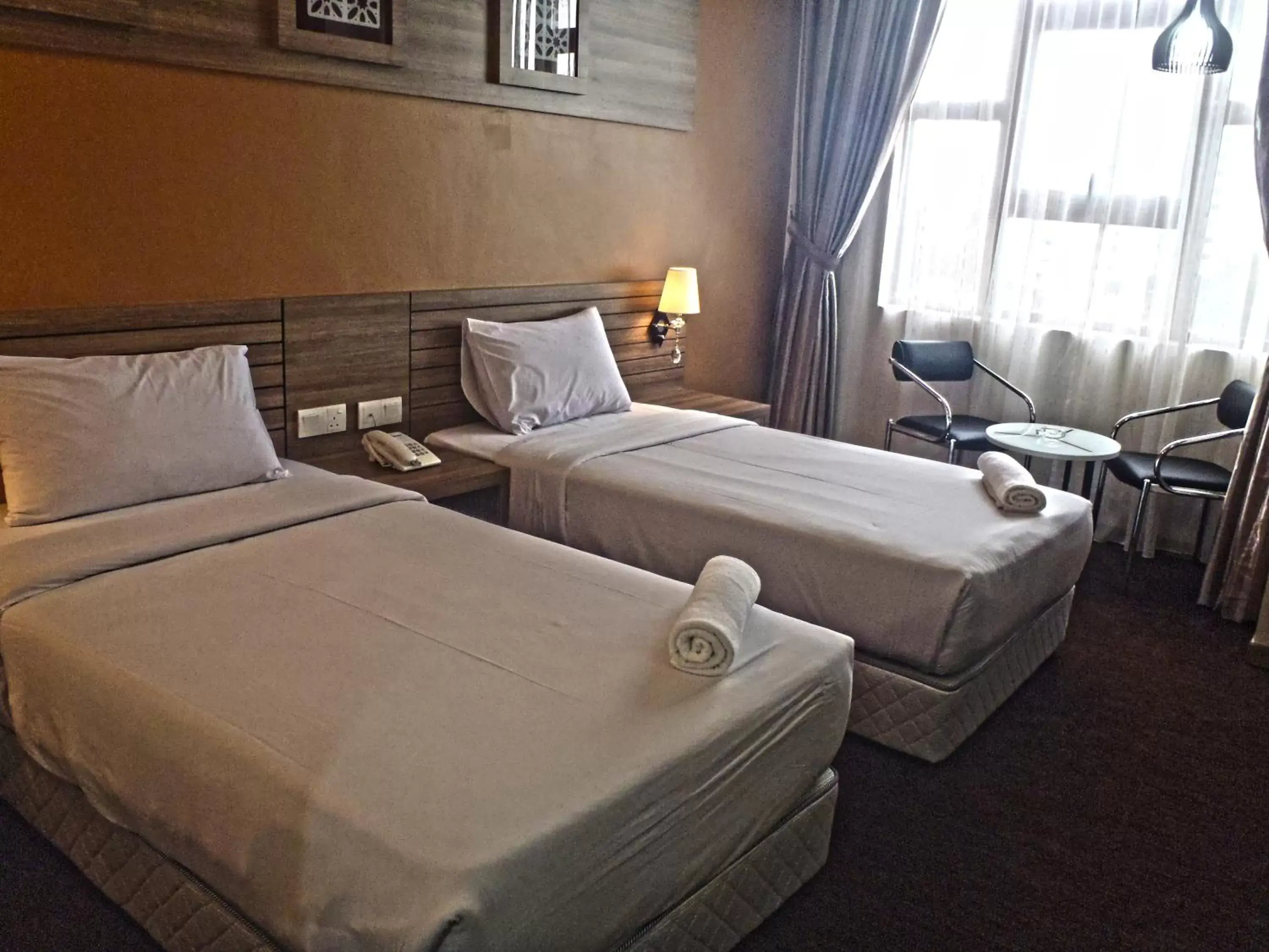 Bed in HIG Hotel