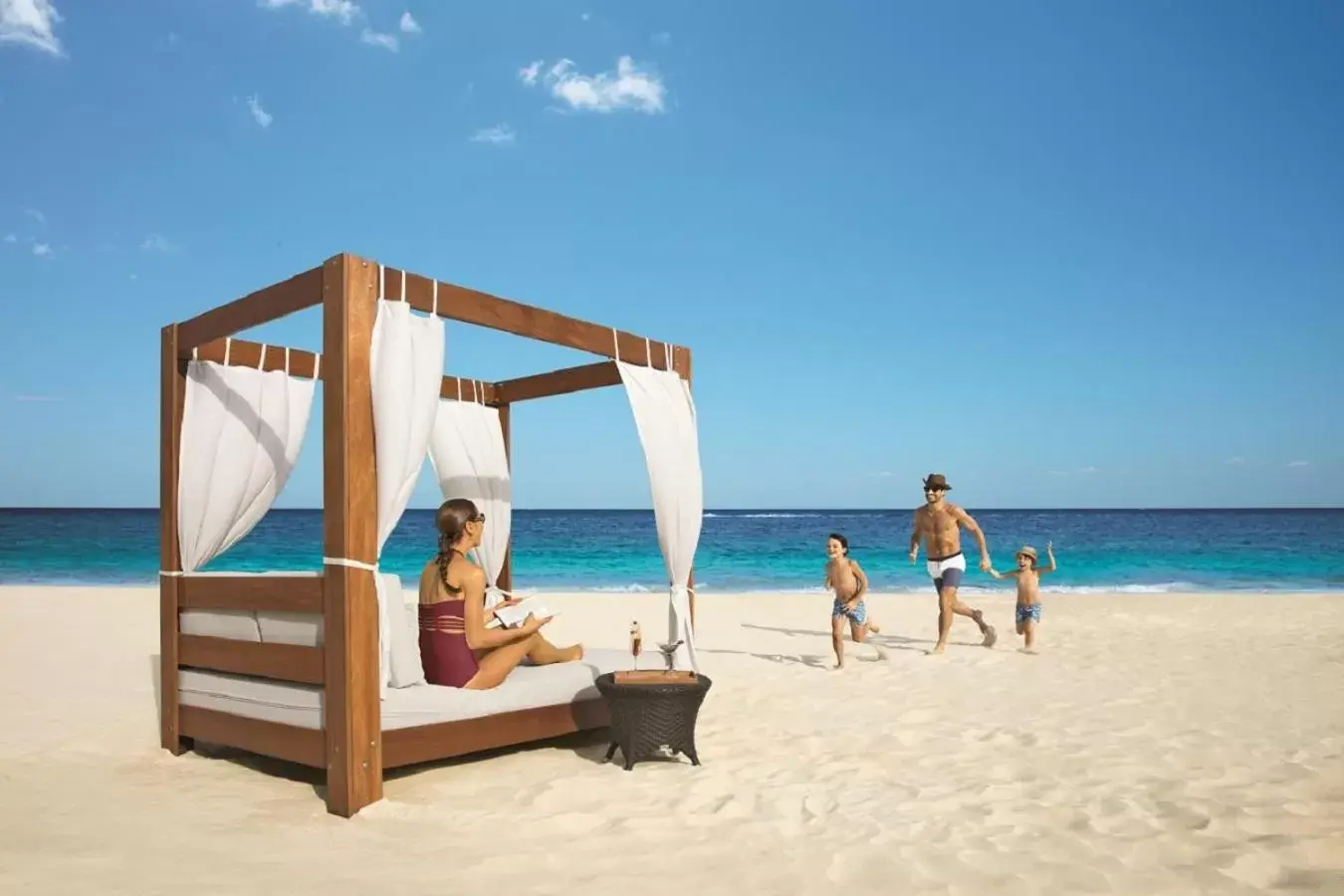 Bed, Beach in Dreams Riviera Cancun Resort & Spa - All Inclusive