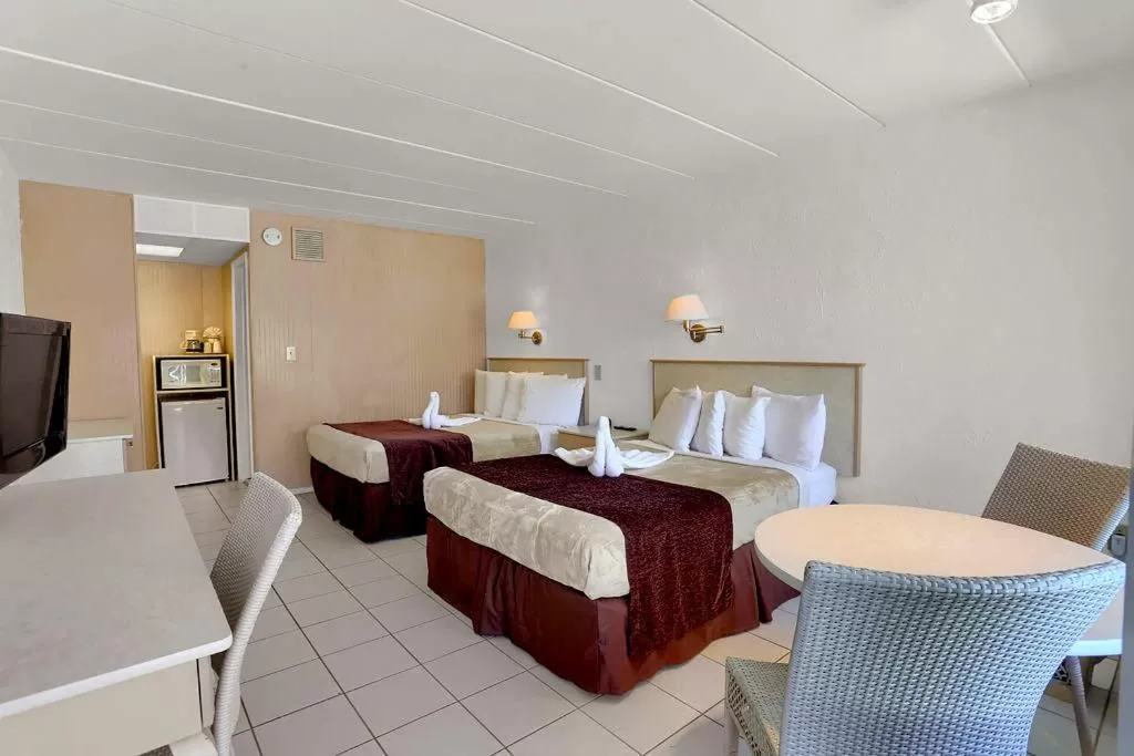 Bed in Heart of Wildwood Boardwalk Motel