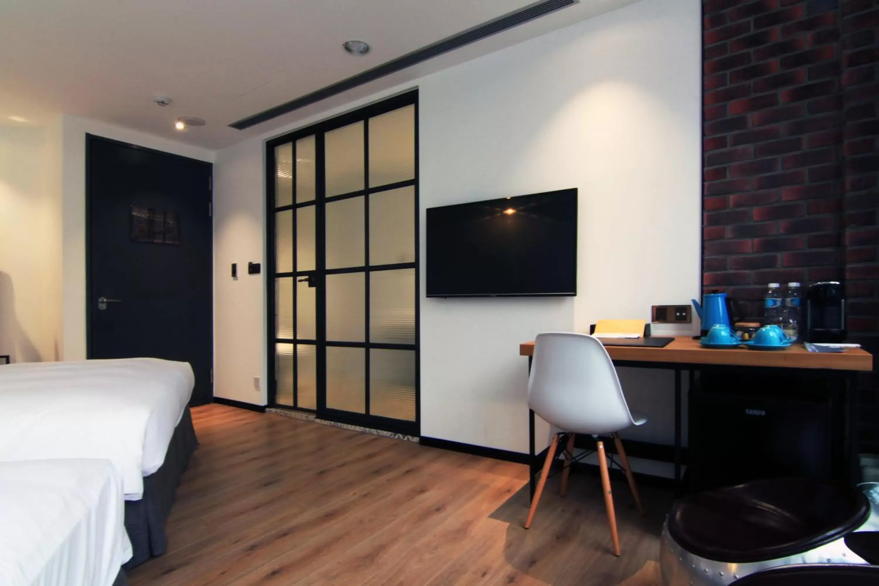 Bedroom, Seating Area in BlueSky Hotel